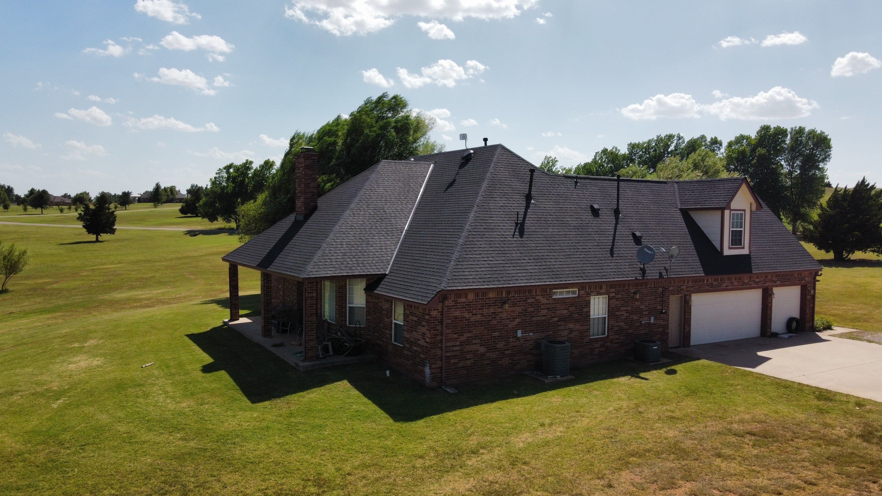 Residential Roofing Installation using GAF Natural Shadow  by A & H Roofing and Contracting
