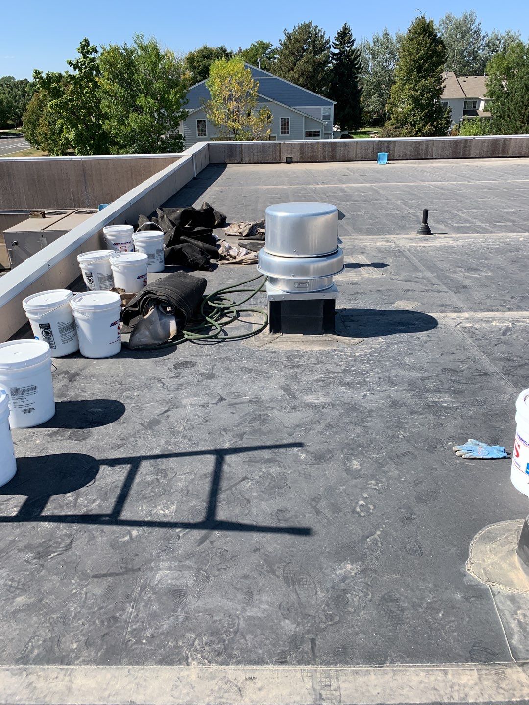 Commercial Roofing Installation using American Standard Coating - S  by A to Z Roofing