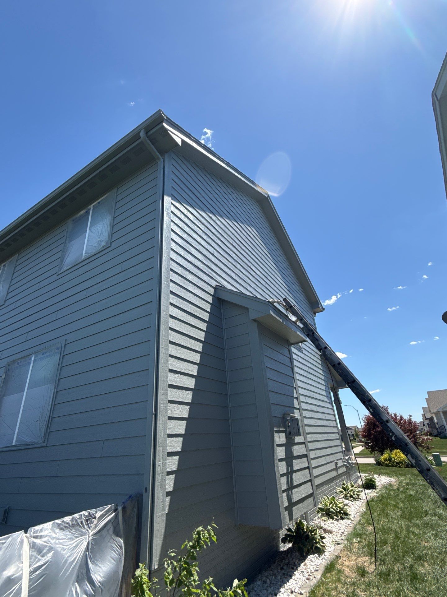 Residential Exterior Repaint in Ankeny by Midwest Paint LLC