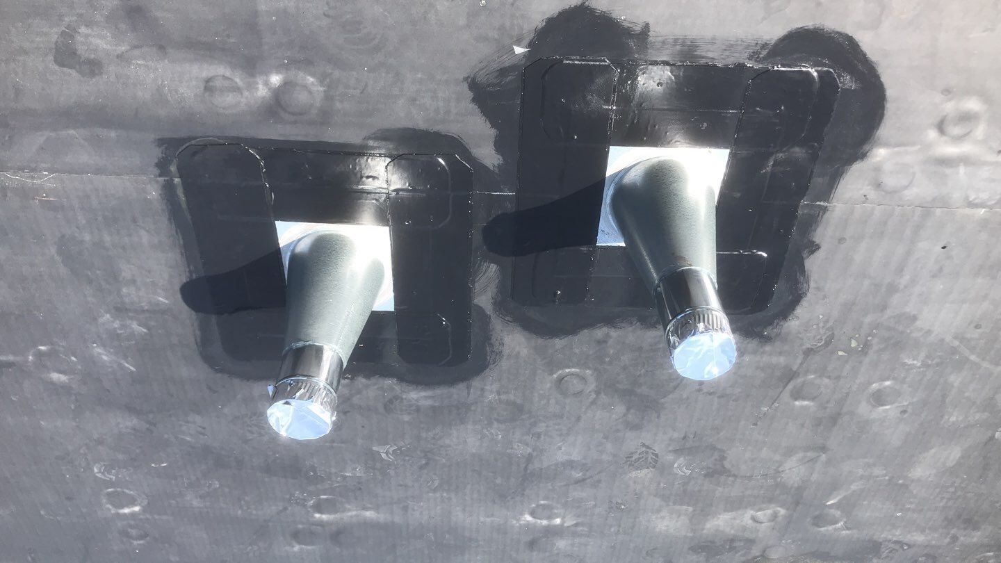 Commercial Roofing Installation using EPDM with white gutters by A Plus Exterior