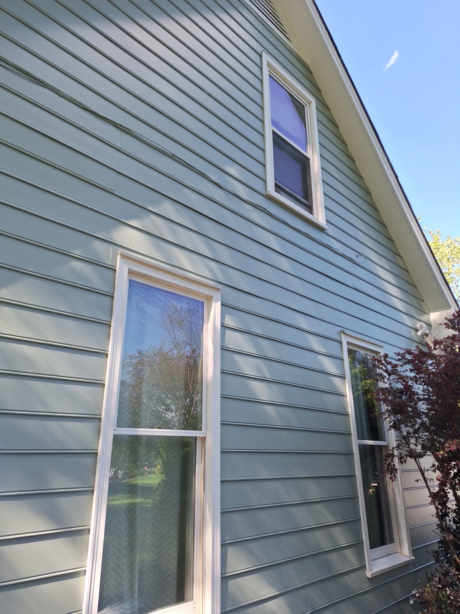 Siding Replacement and painting by GonzalezPainters & Contractors Inc 
