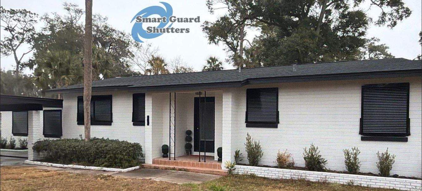 Impact Bahama Shutters in Jet Black by Smart Guard Shutters