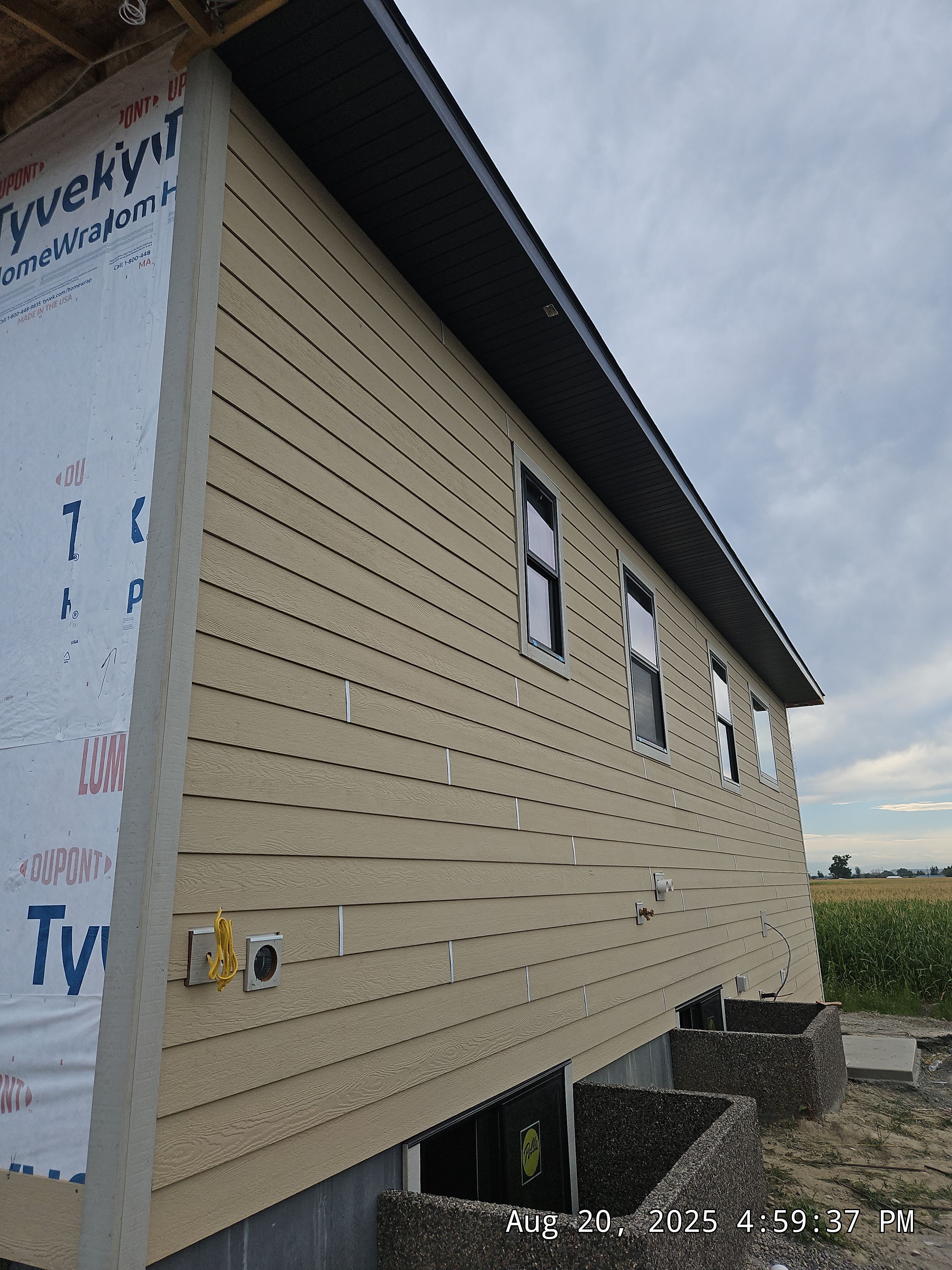 New Construction LP Smartside by Plankwalker Siding & Roofing