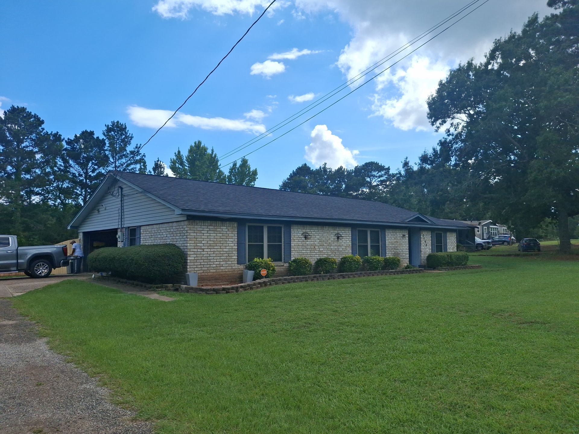 Exterior Refresh Brick Painting Job in Overton, TX by Quality Coats Painting