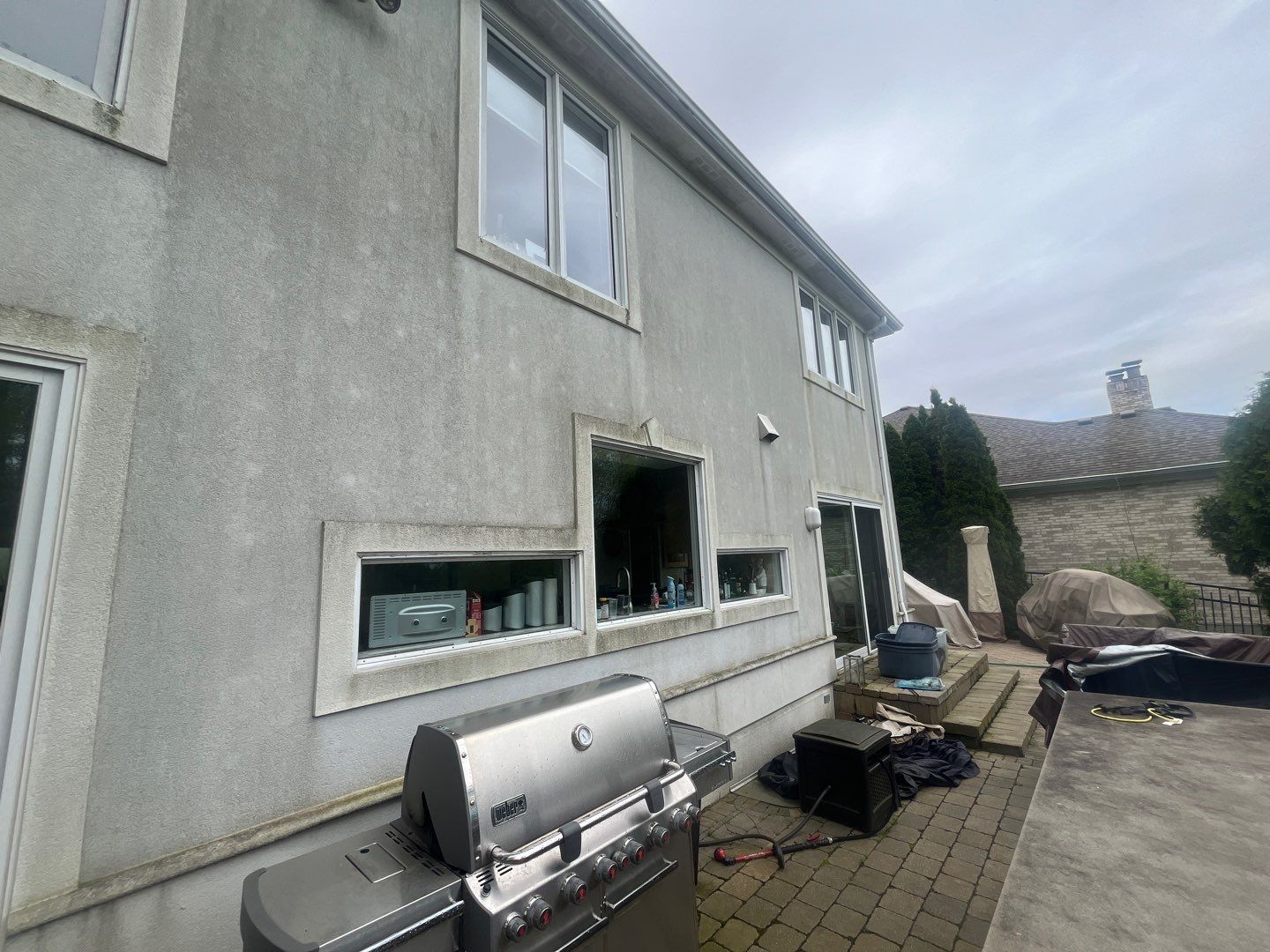 dryvit using Algaecide, soft wash soap by Northern Power Washing LLC.