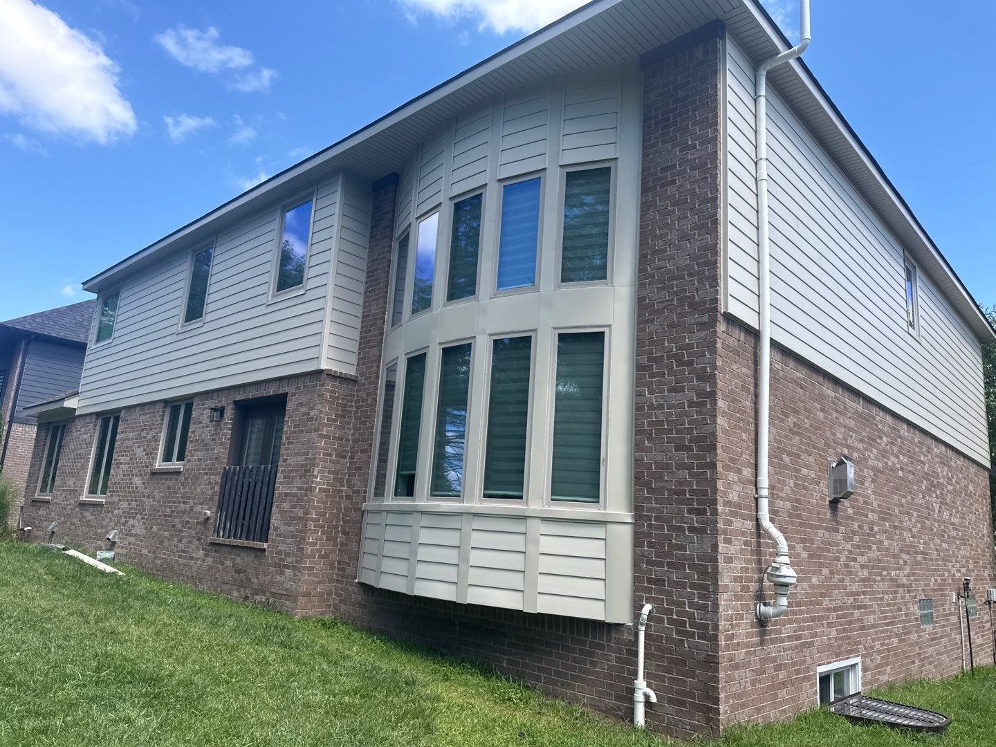 Siding Replacement using Alside S7 Cedar Mill Grain Composite by 180 Contractors