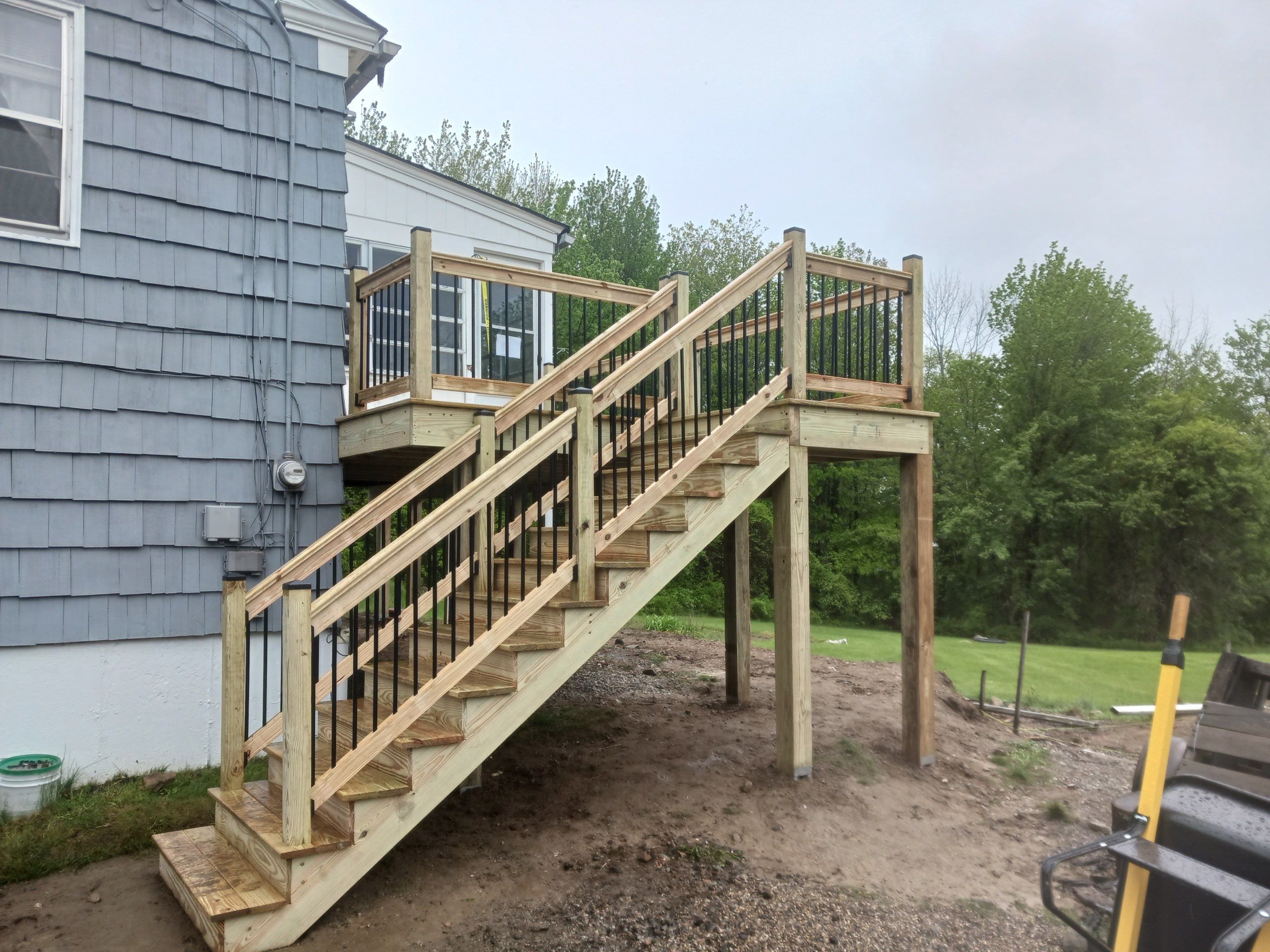 Moultonborough, NH – Pressure-Treated Deck Installation by Tall pine roofing
