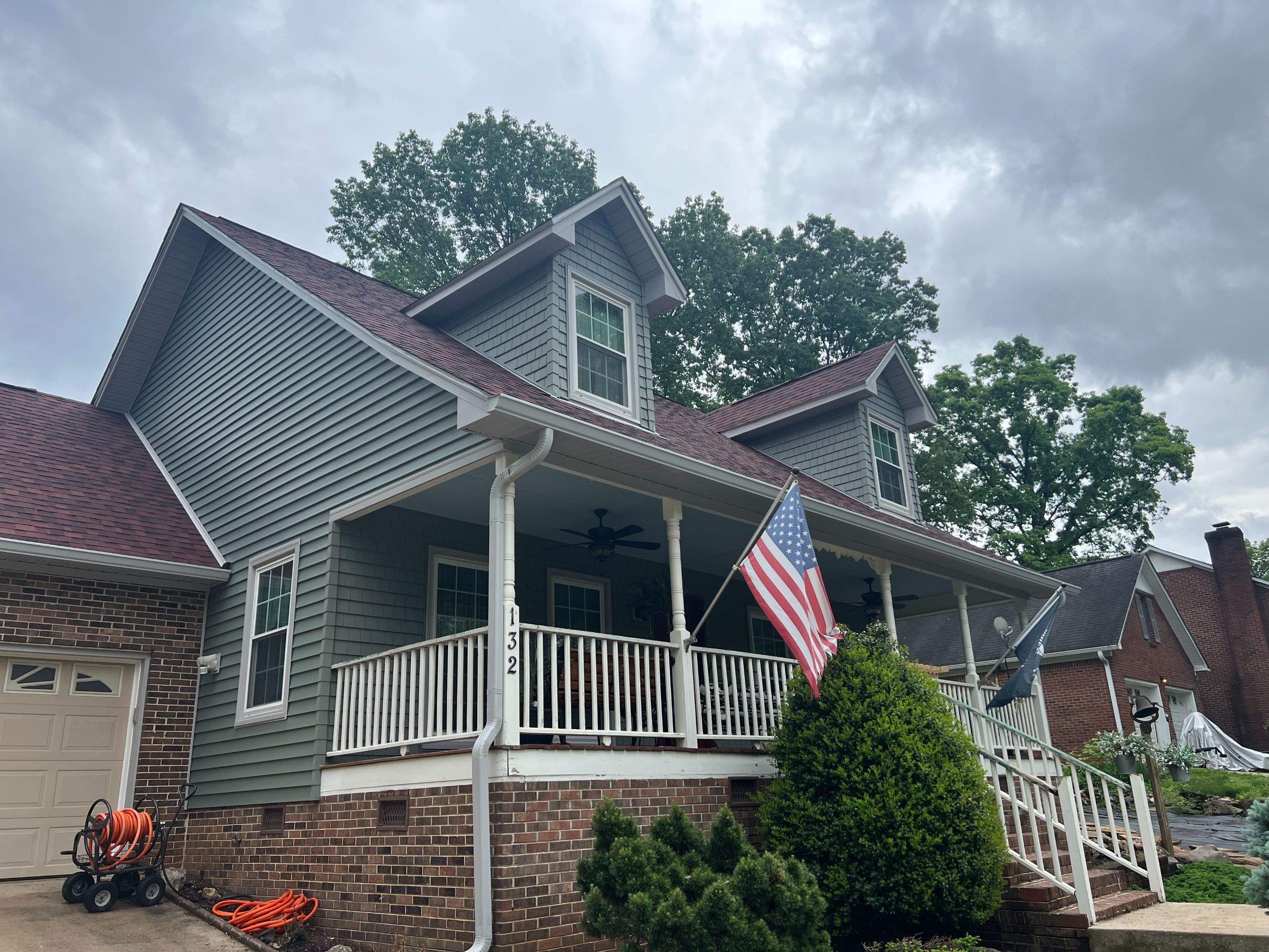 Siding Replacement using Mastic Carvedwood Vinyl Plank by Freedom Exteriors