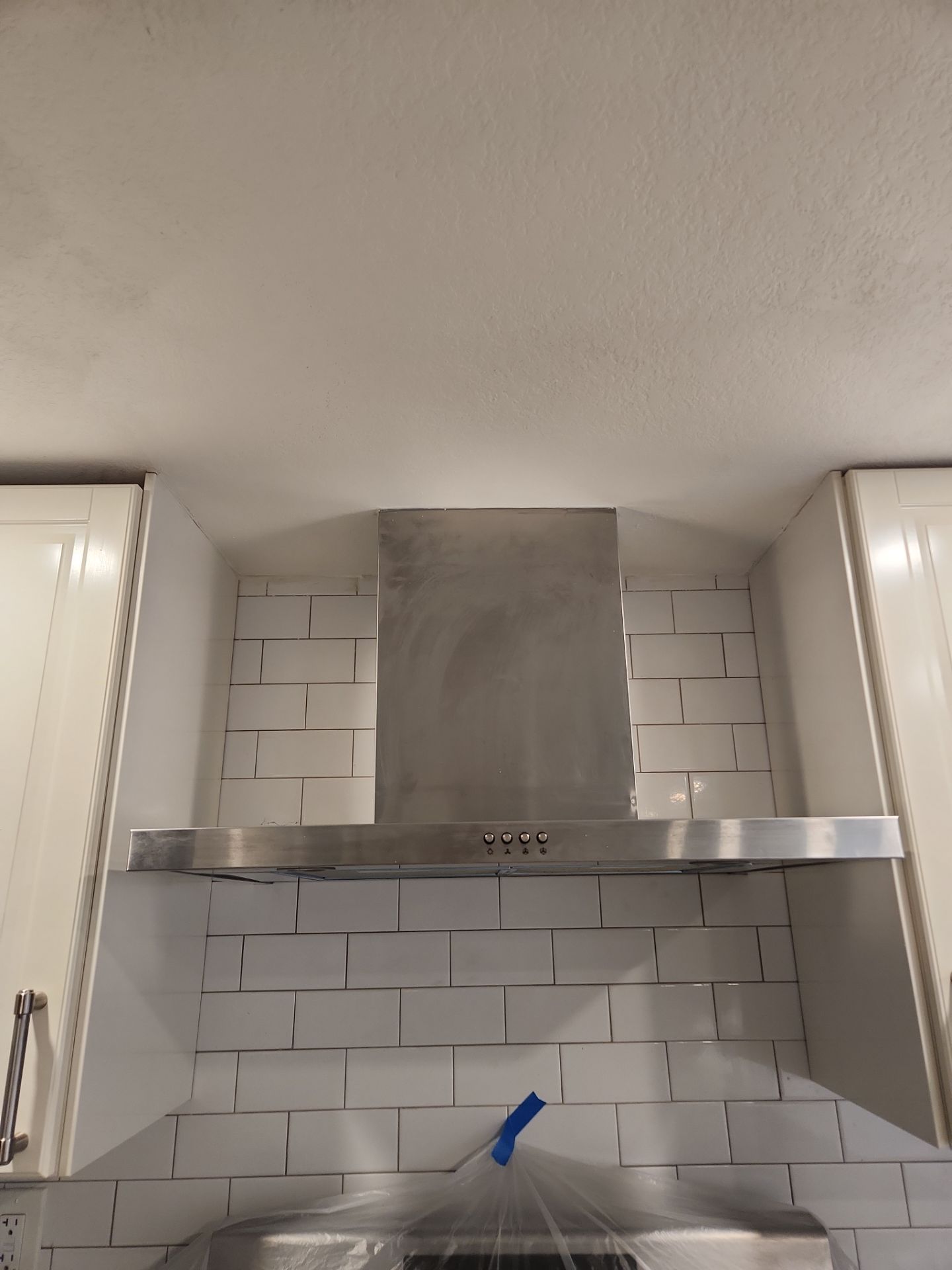 Drywall repair and door painting in S. Austin-78745 by RejuveNate Renovations LLC