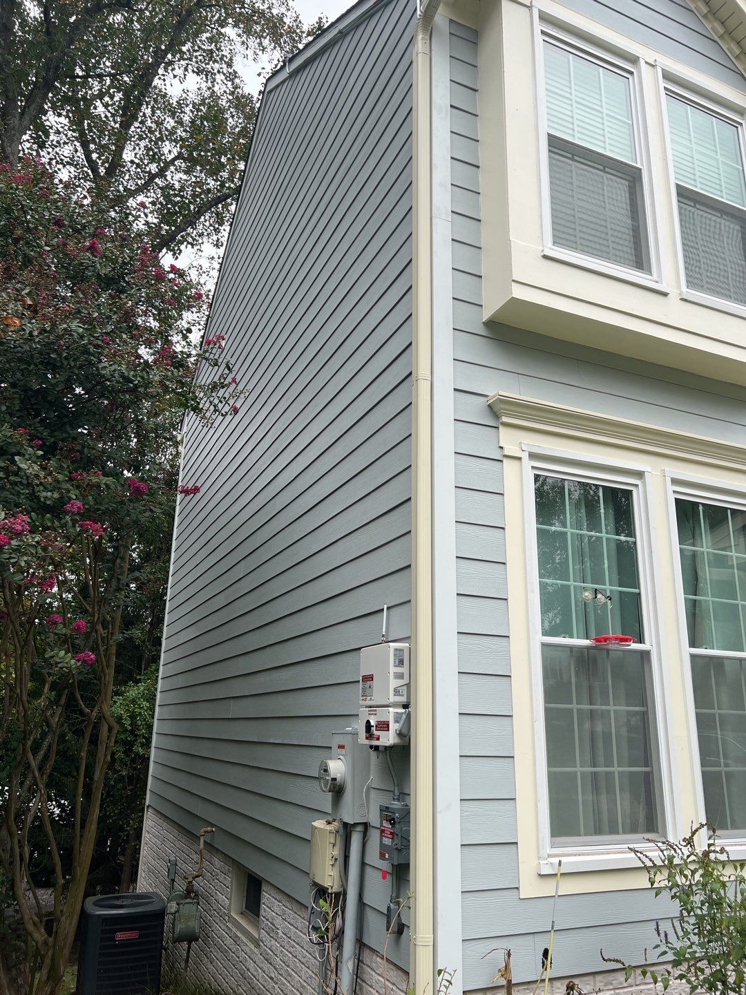 Exterior Home Makeover using GAF Timberline HDZ, GAF Decotech, and James Hardie Siding by American Home Contractors