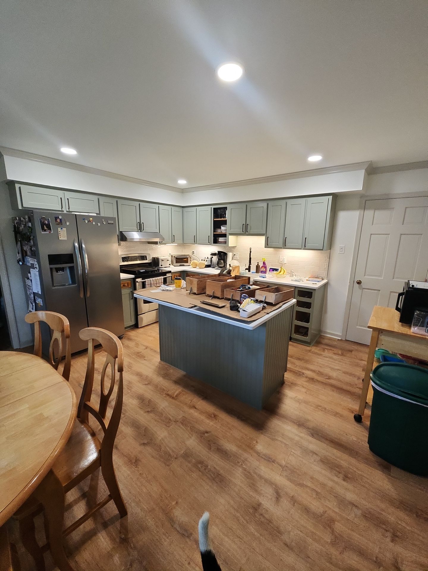 A Pathway to Personality – A Two-Tone Kitchen Transformation in Apex by Elite Remodeling and Design LLC