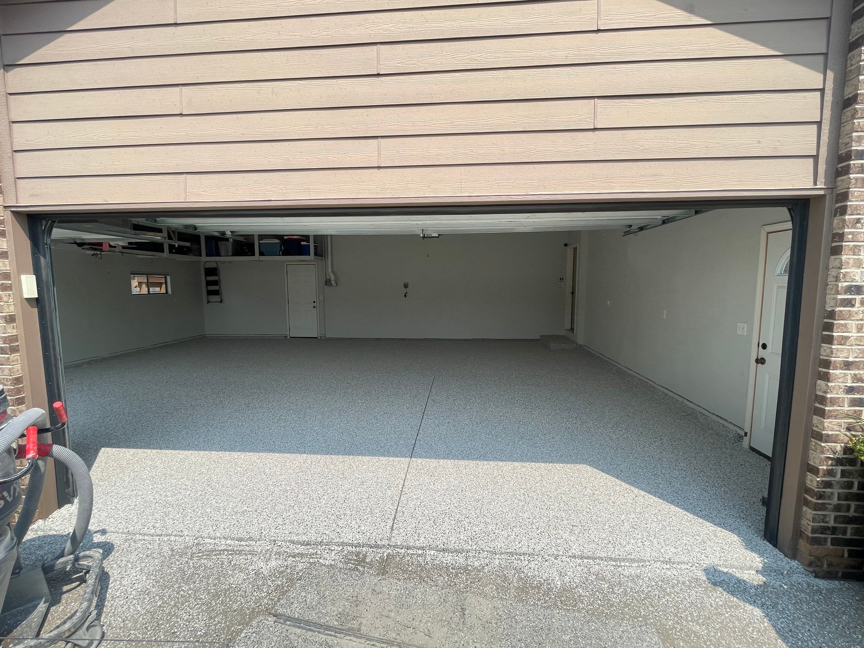 Multi-Car Garage Floor Coating and Crack Repair in Tea by Select Painting, Coatings & Garage Cabinets