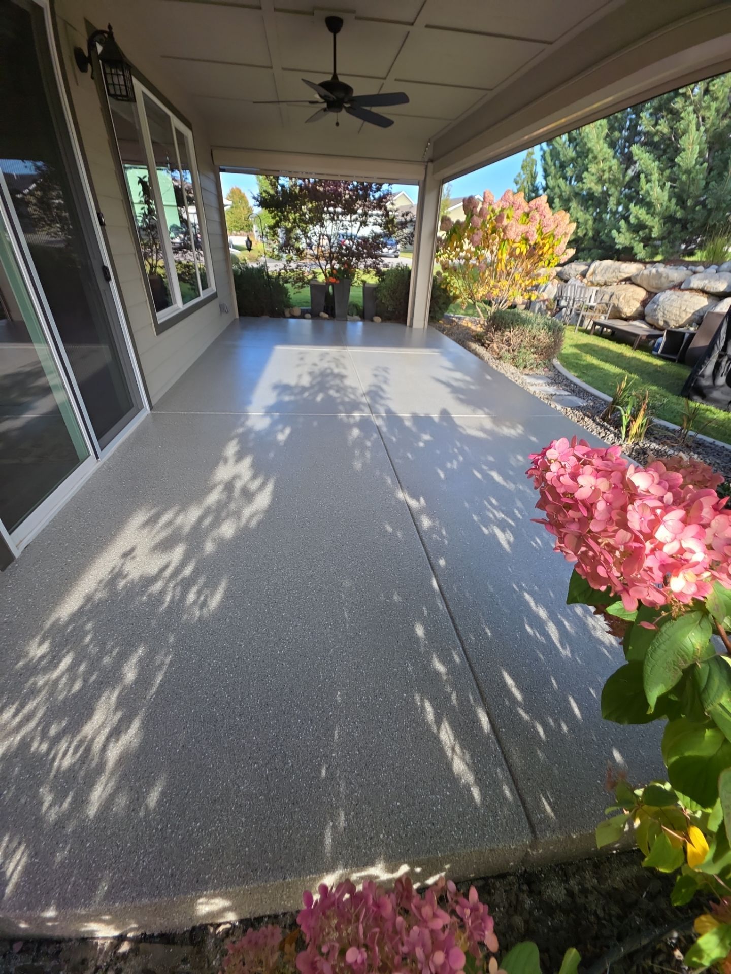 Front Porch and Back Patio Concrete Transformation in Liberty Lake by Croc Coatings, LLC
