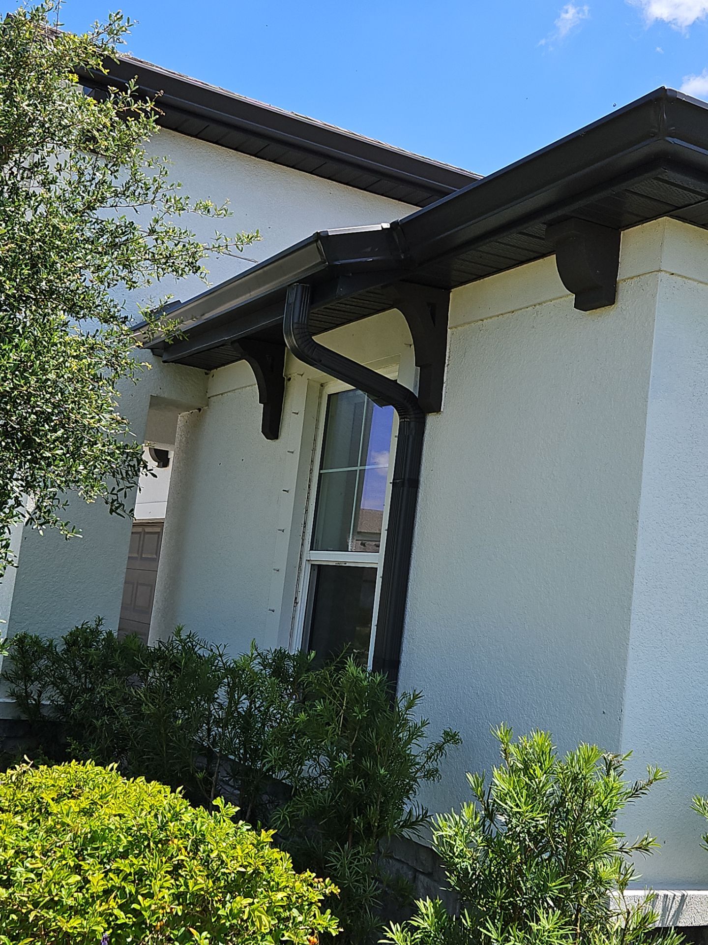 K-Style Seamless Gutter Installation using bronze gutters in Sarasota FL by Gutter Professors