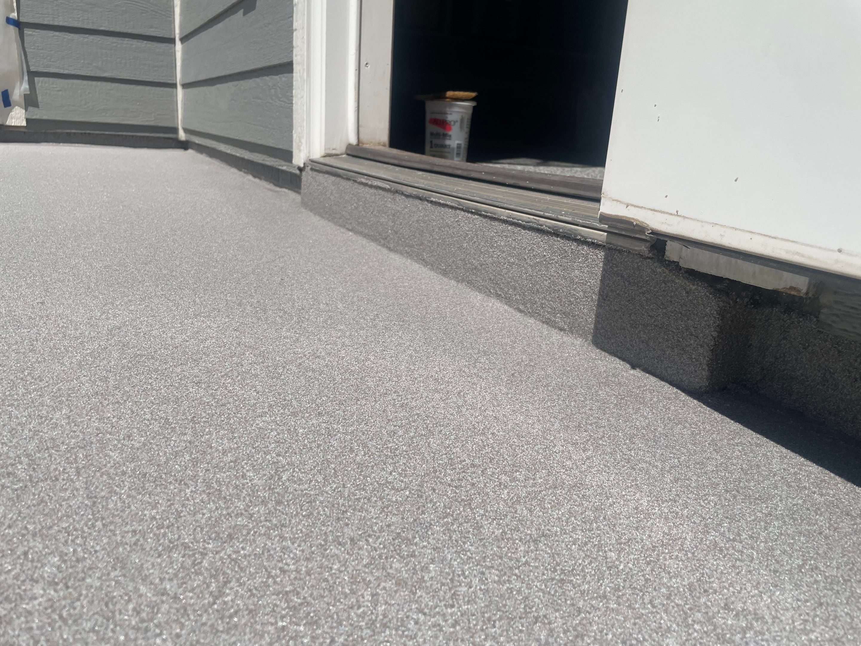 Concrete Patio Coating with Fuzzy Wool Finish in Sioux Falls by Select Painting, Coatings & Garage Cabinets