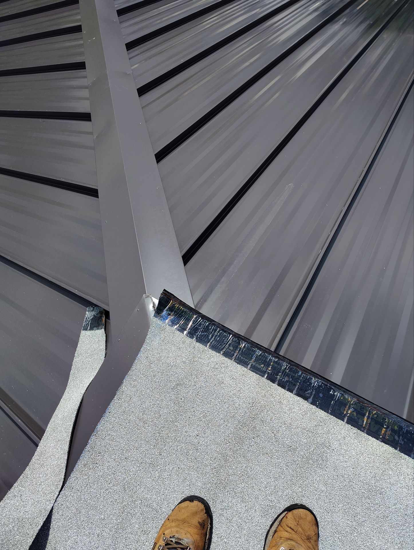 .032 Aluminum 1.5" Mechanical Seam Dark Bronze  by Total Roofing System The Metal Roof Experts
