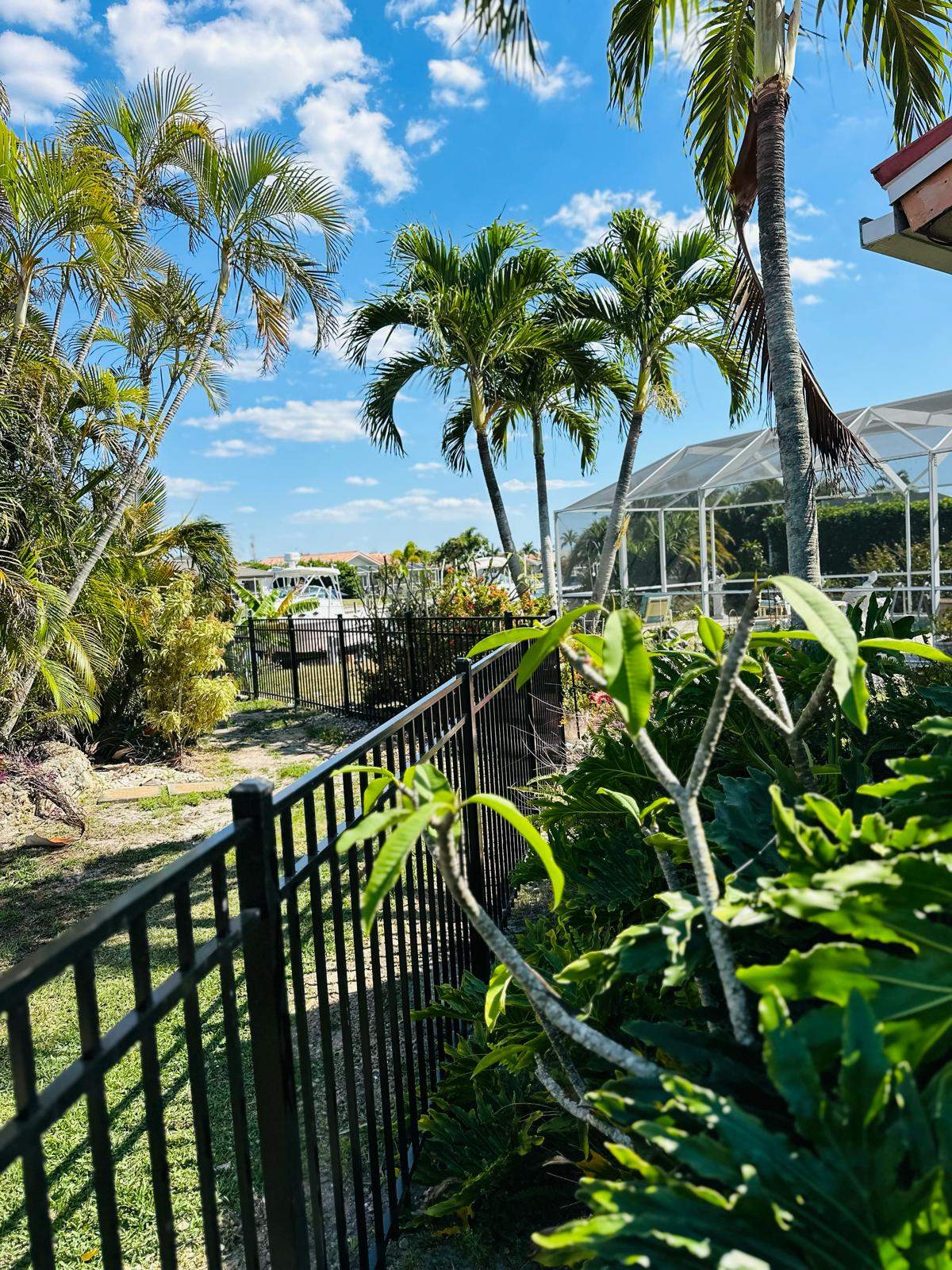 Waterfront Aluminum Picket Fence Installation in Punta Gorda by True Fence LLC