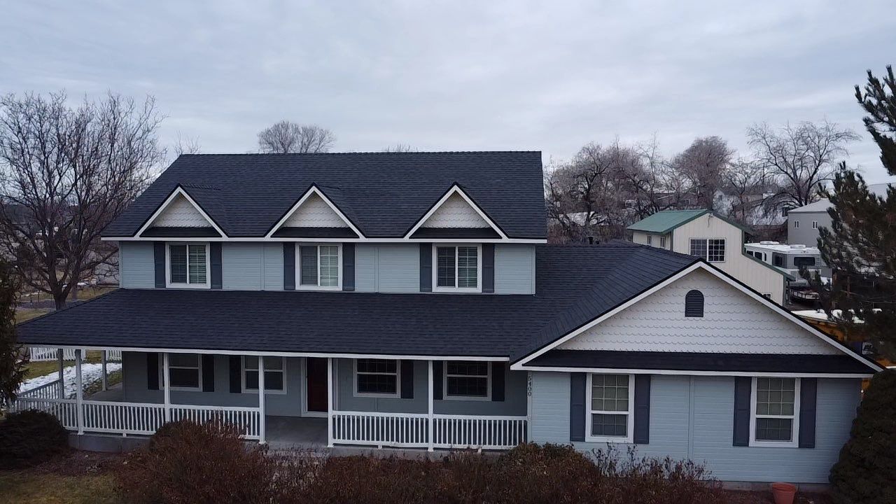 Big Style in Mission Pointe – New Roof with DecoRidge & Onyx Black Finish by ID Roofing LLC