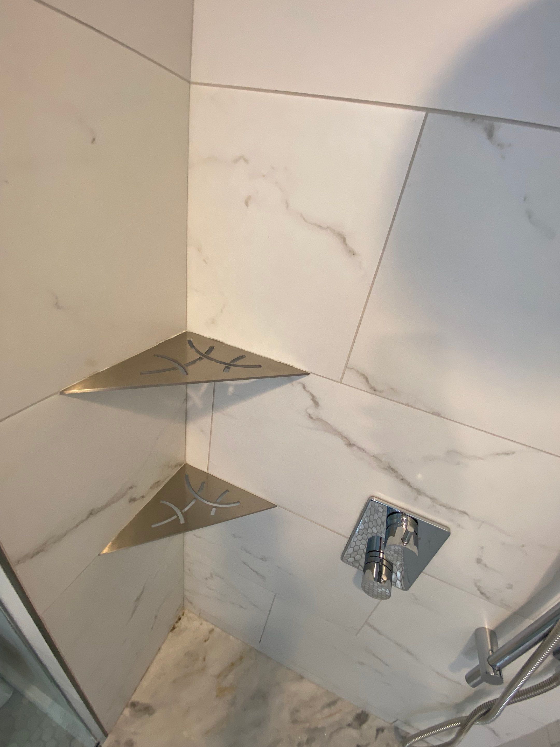 Luxury Bathroom Remodel with Marble Tiles in Kennesaw by Swift Home Renovations 