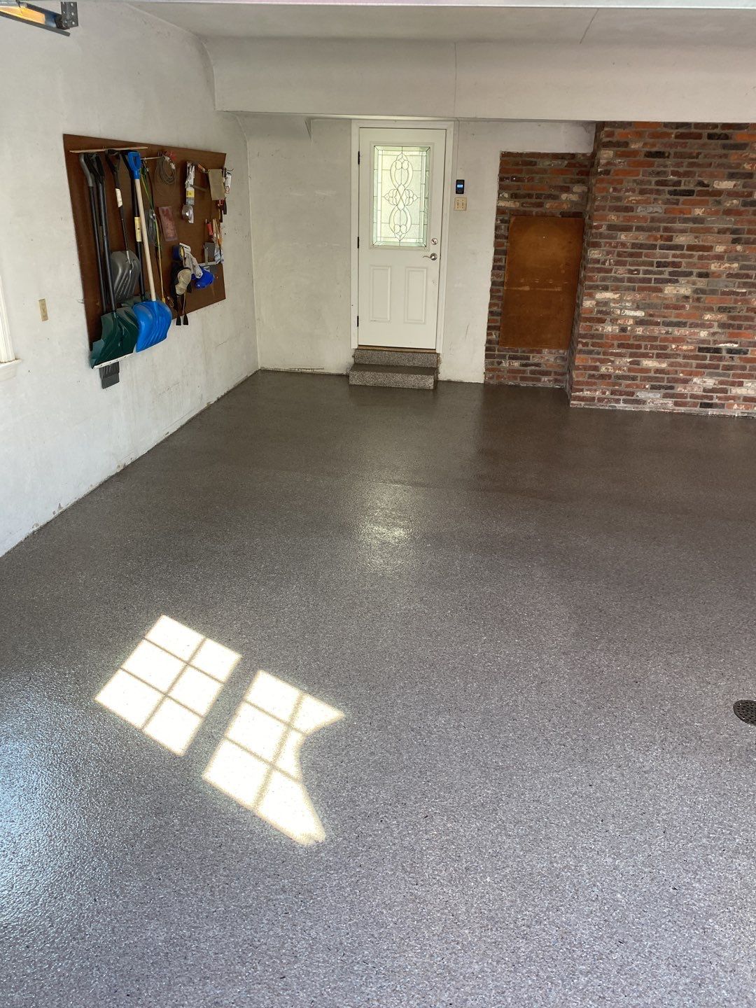 Large Patio + Garage Project in Pittsburgh by Floors in a Day, Inc