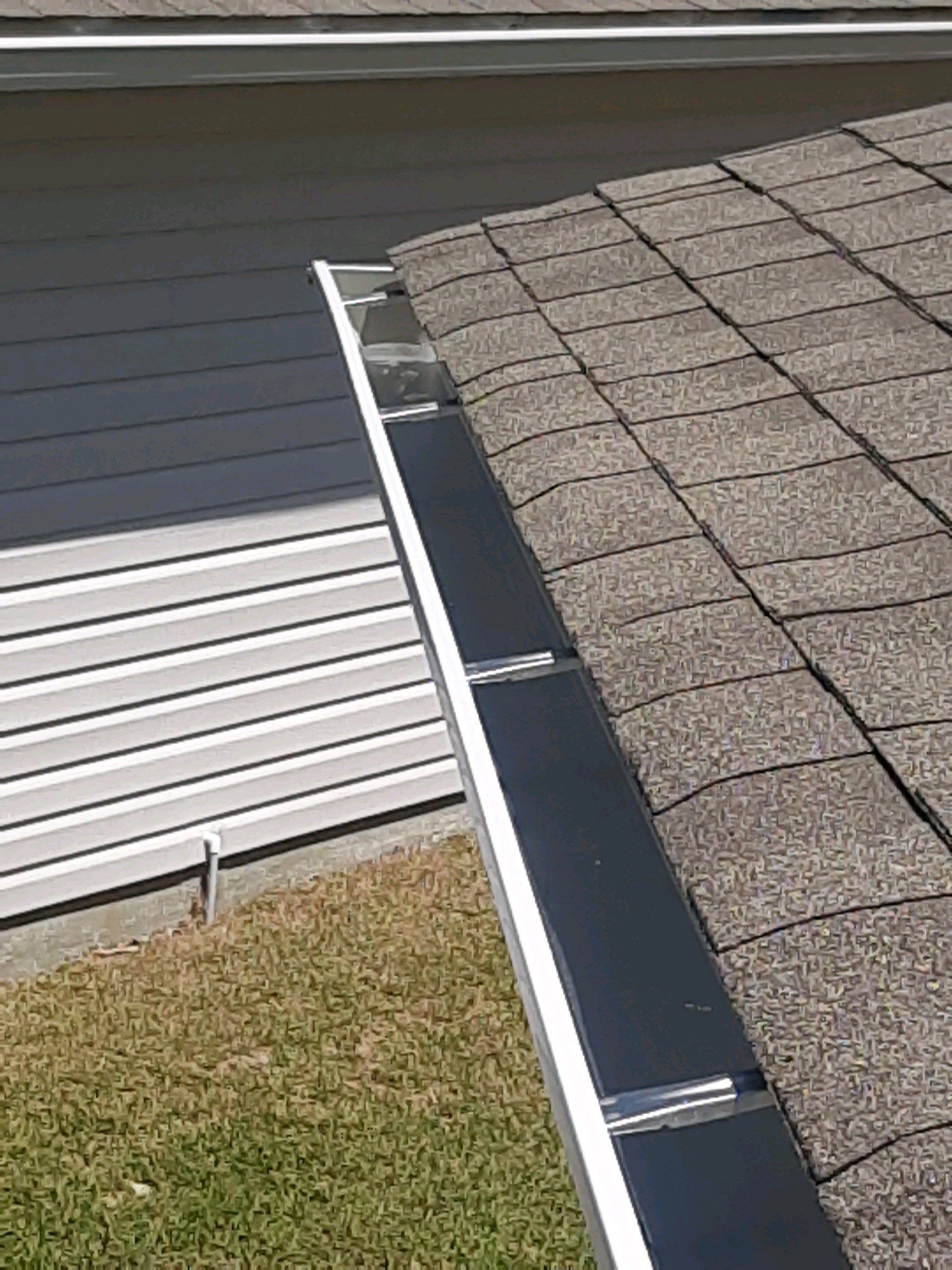 Gutter Installation Using White K-Style Seamless Gutters by Gutter Professors