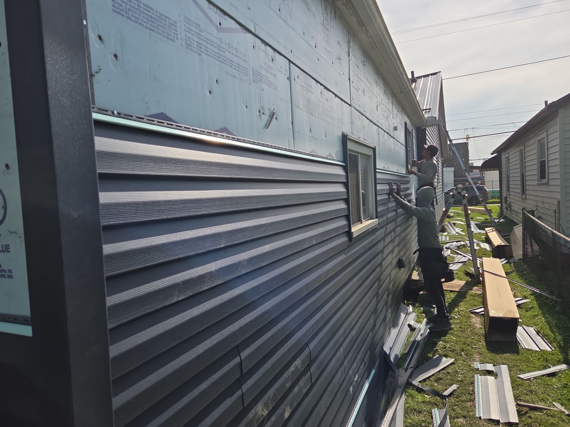 Complete Vinyl Siding Replacement in Huntington by Mr. Roofer