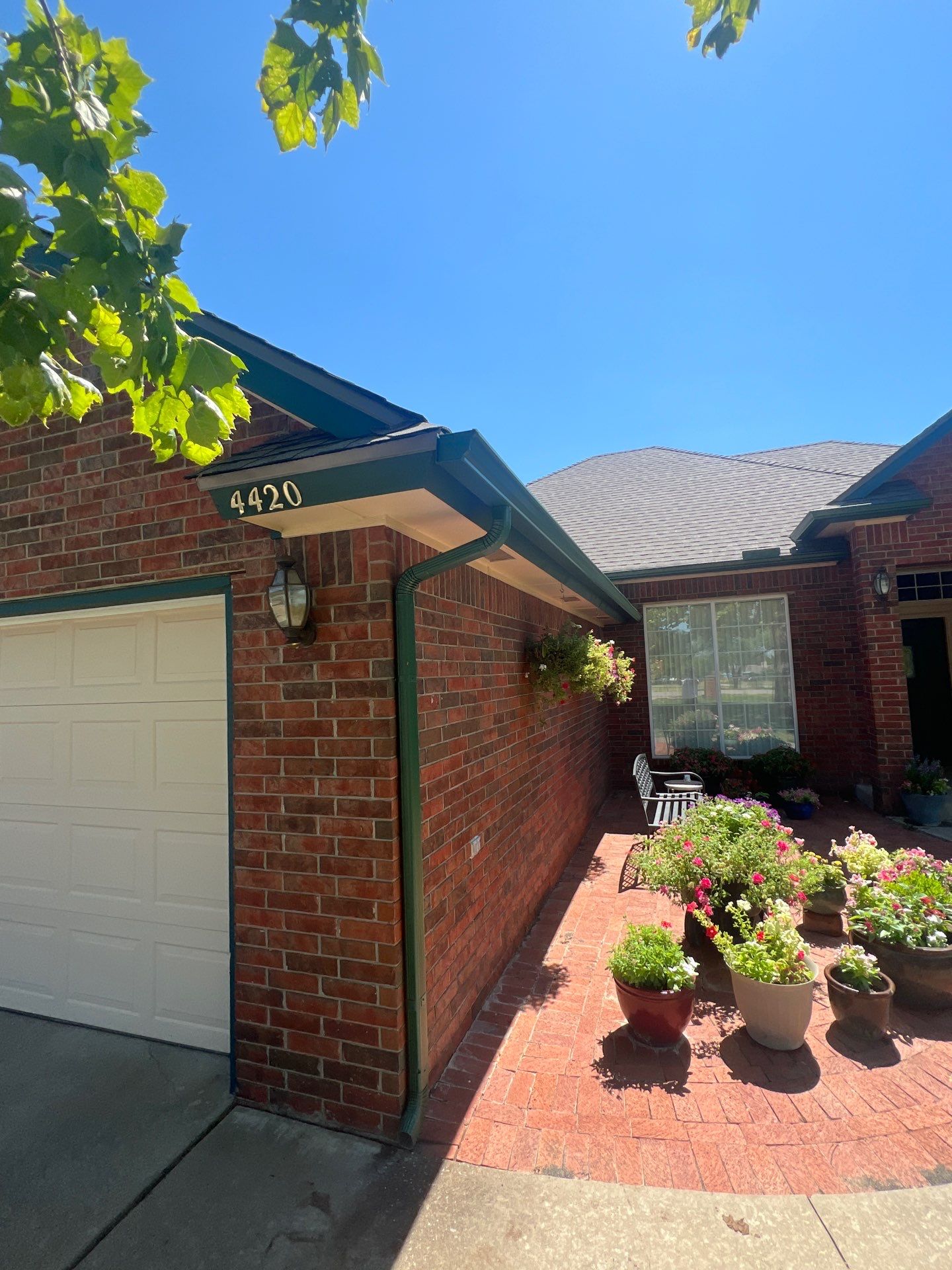 Roof Replacement and Gutter Installation in Edmond, OK by McCann's Roofing and Construction