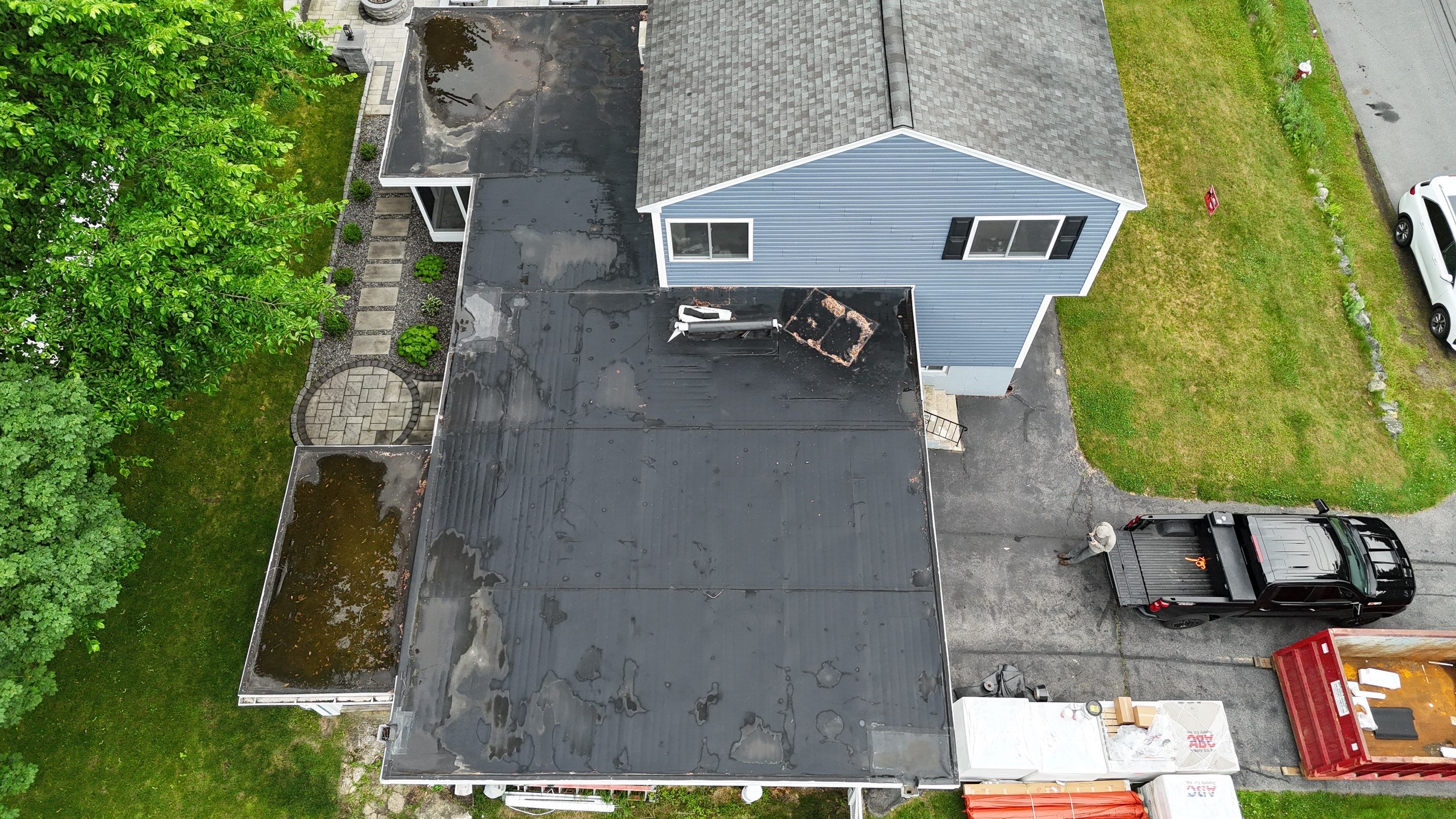 EPDM Flat Roof Installation + Seamless Gutter Upgrade by Mighty Dog Roofing of Greater Middlesex County