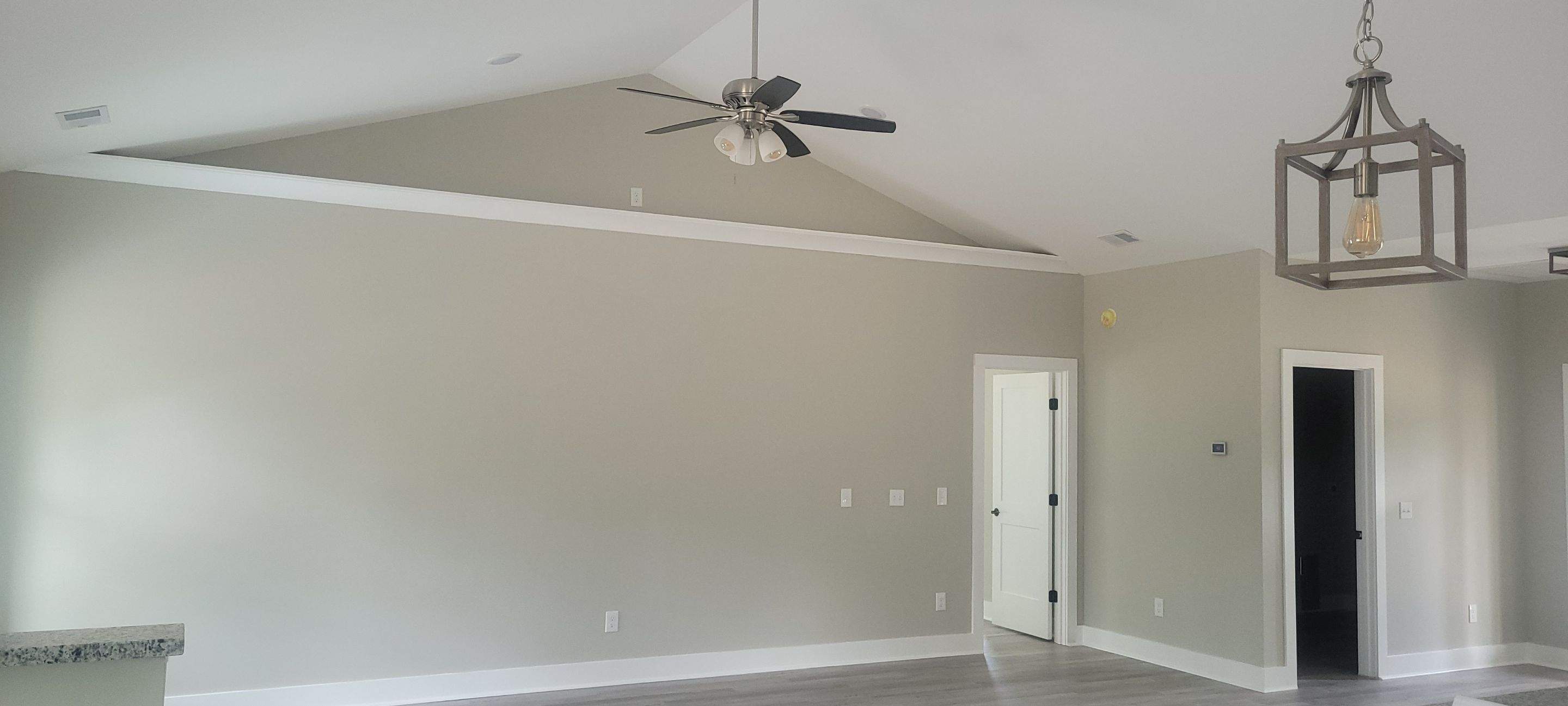 New Home Construction using brick and vertical vinyl by Cornerstone Home Builders, LLC
