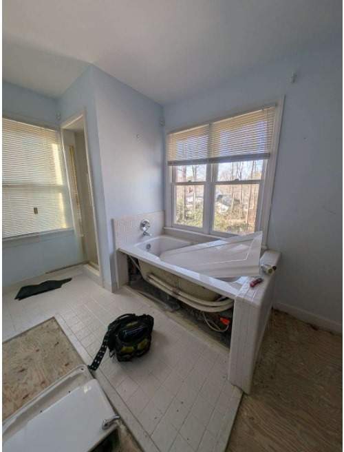 From Cramped & Carpeted to Bright & Modern: A Cary Bathroom Transformation by Elite Remodeling and Design LLC