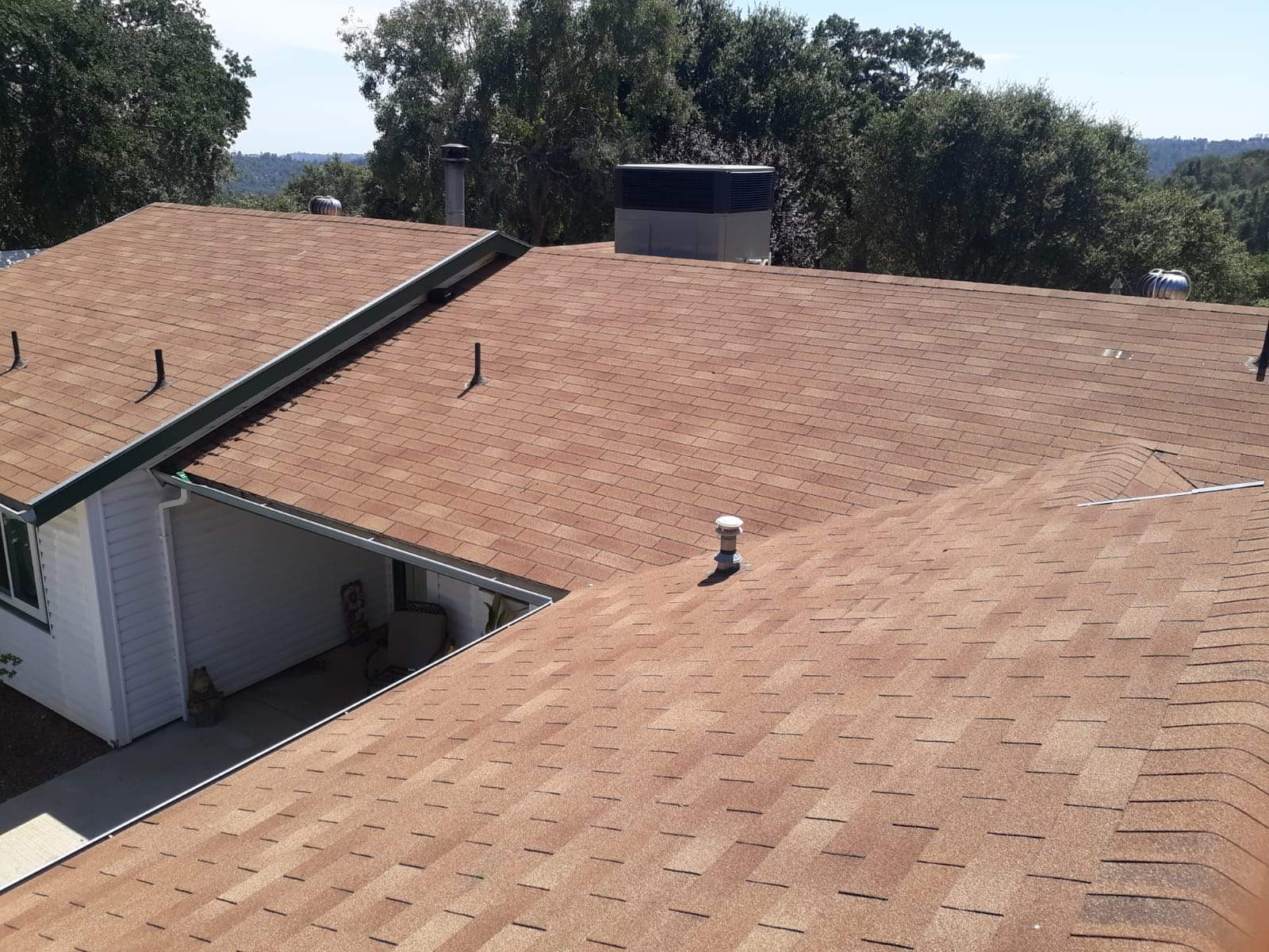 Metal roofing installation using Standing seam metal roofing system by Straight Edge Roofing Inc