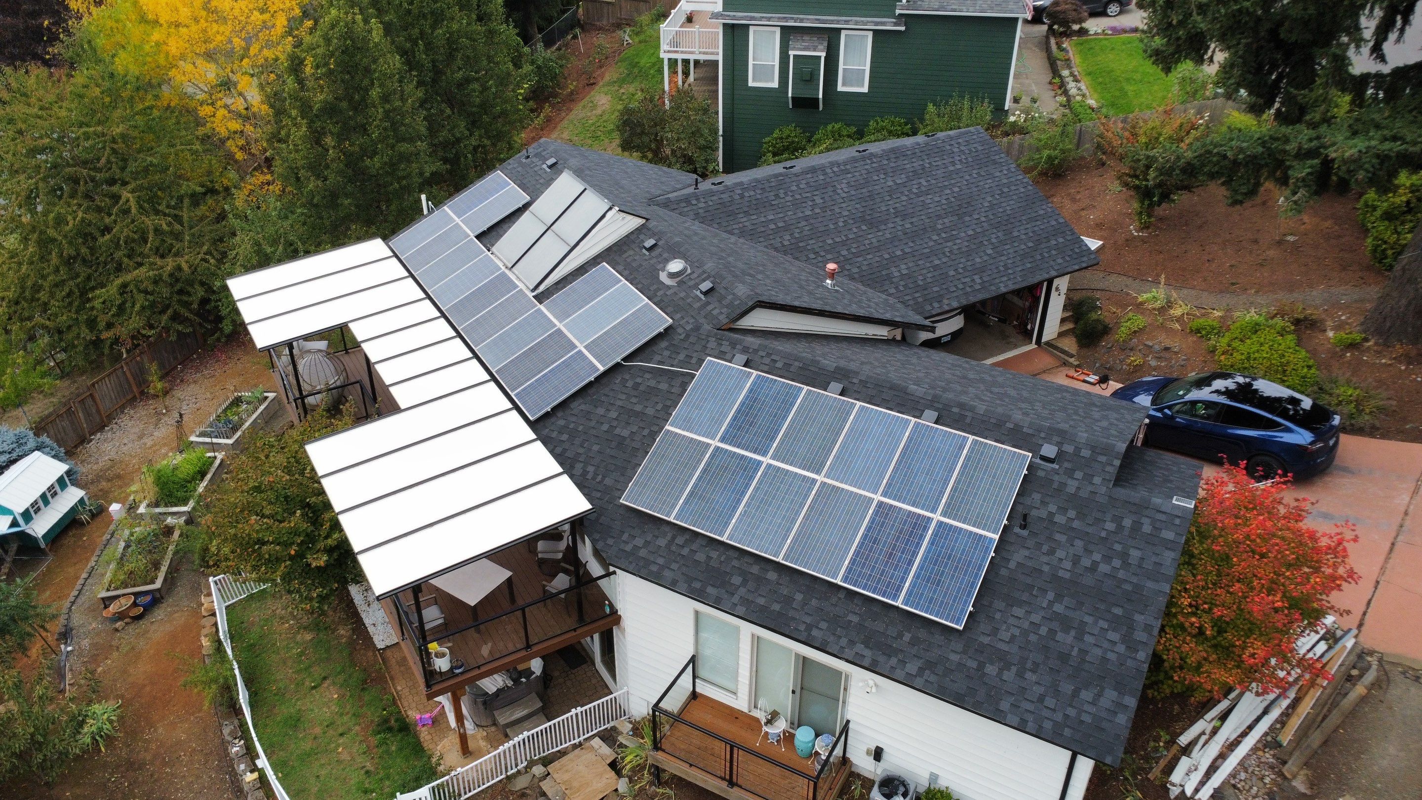 Granite Black Residential Roof Replacement by Orezona Building & Roofing Company, Inc.