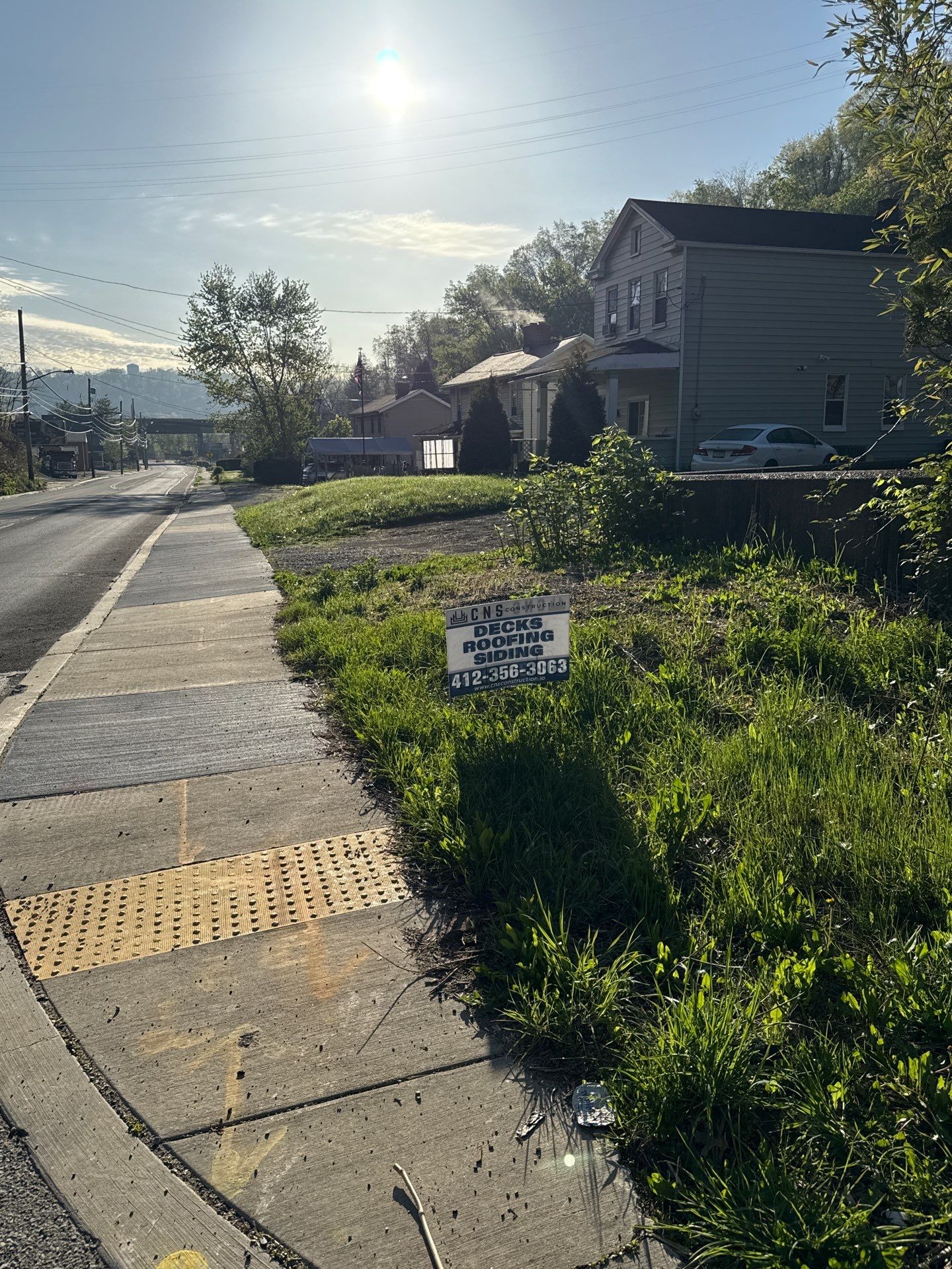 Roof sunspace deck  by Cousins Roofing Siding & Decks