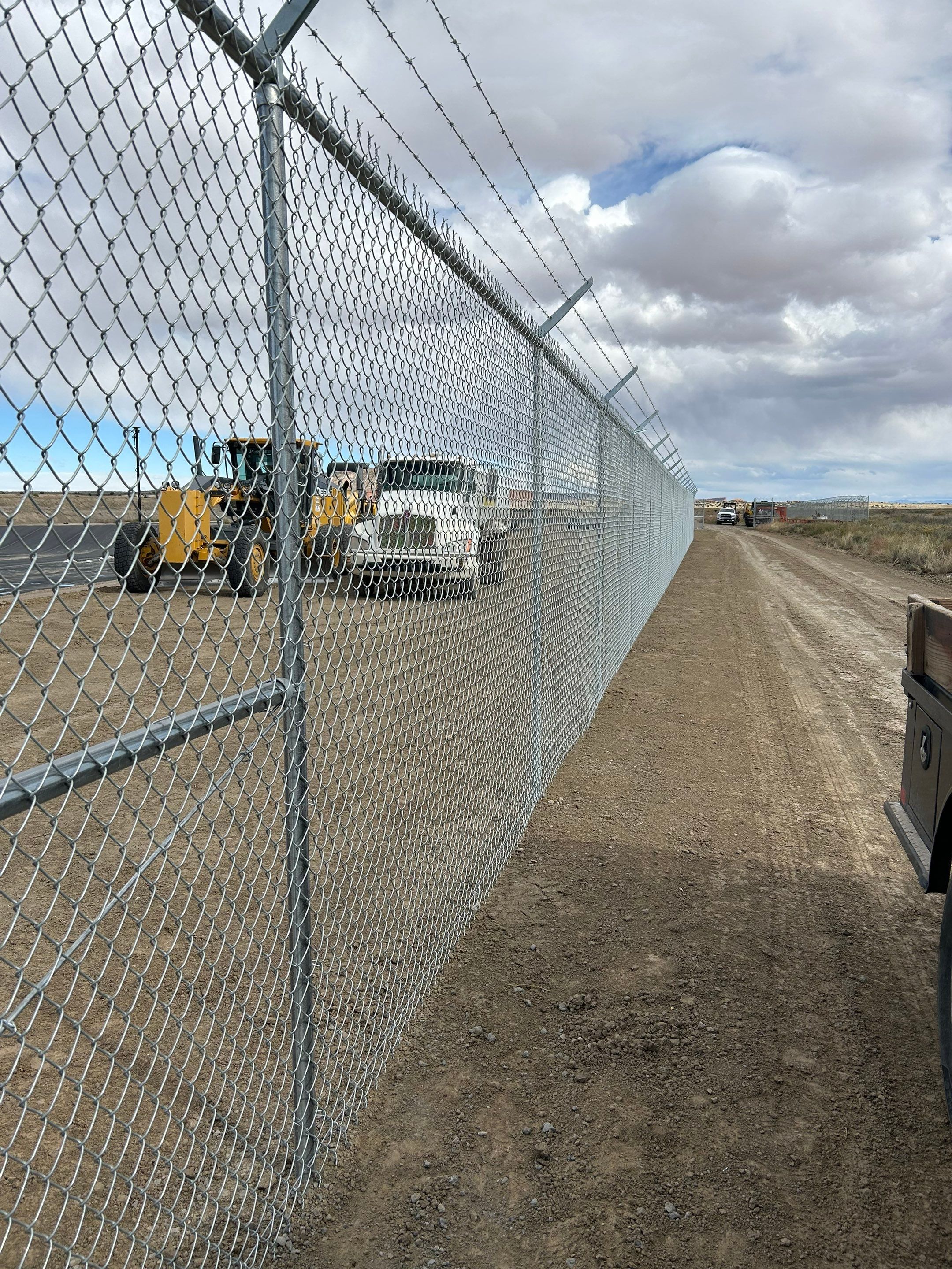 Commercial  using 8'+1' 9ga chain link by Valley Fence Company