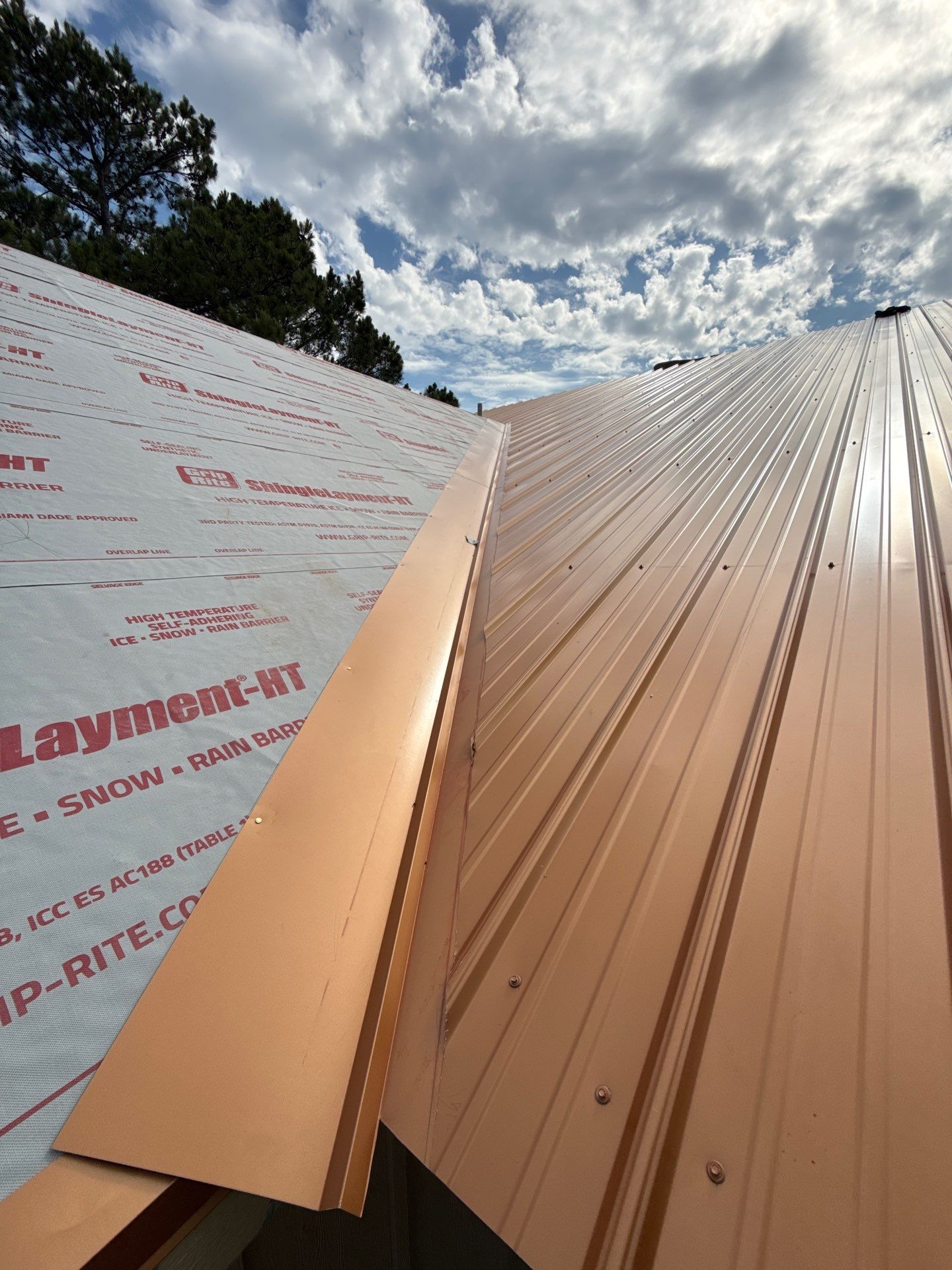 Copper Metallic 26-gauge low rib metal roofing. by In & Out Construction & Remodeling, LLC