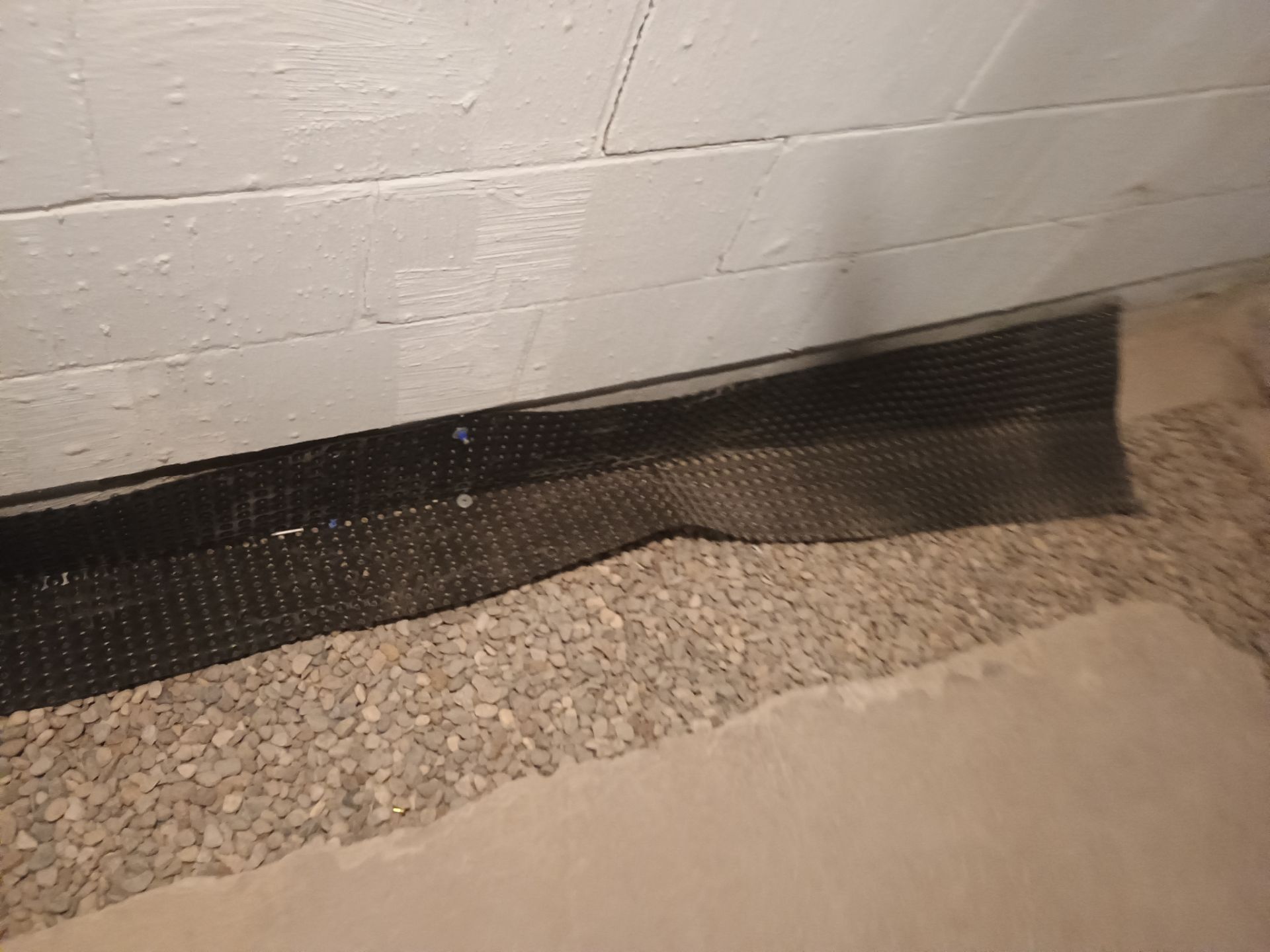 Interior Drain Tile Installation in South Minneapolis by Waterproofing Northeast