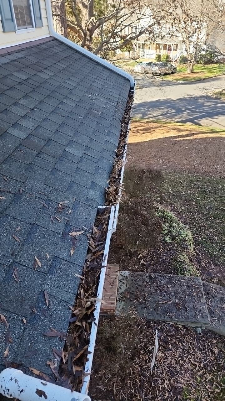 Gutter Cleaning using water by Power Wash Masters LLC