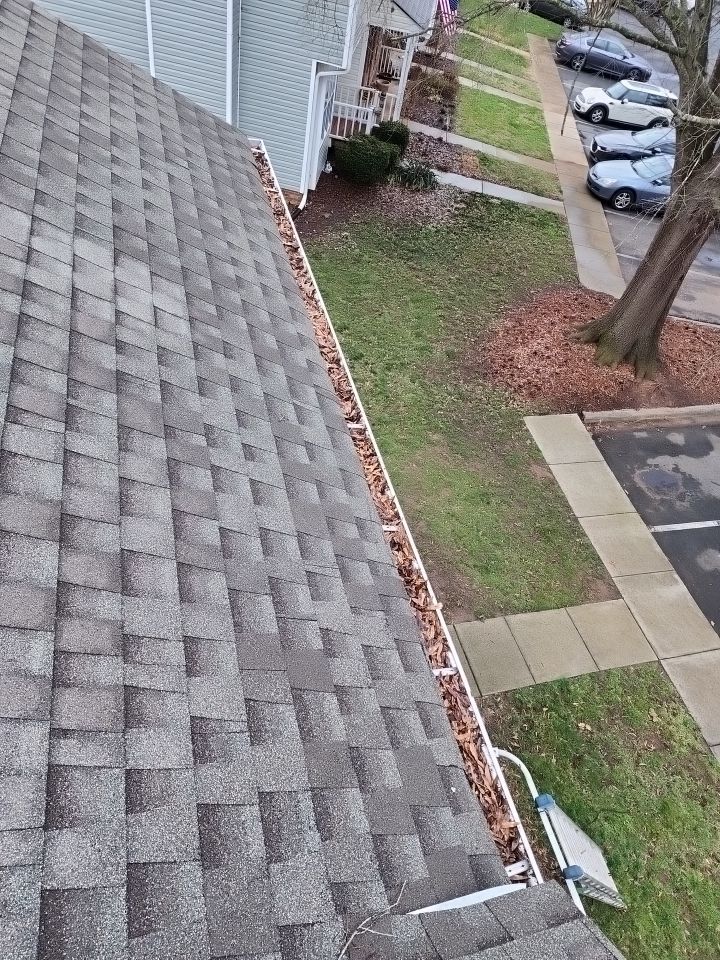 Gutter Cleaning using water by Power Wash Masters LLC