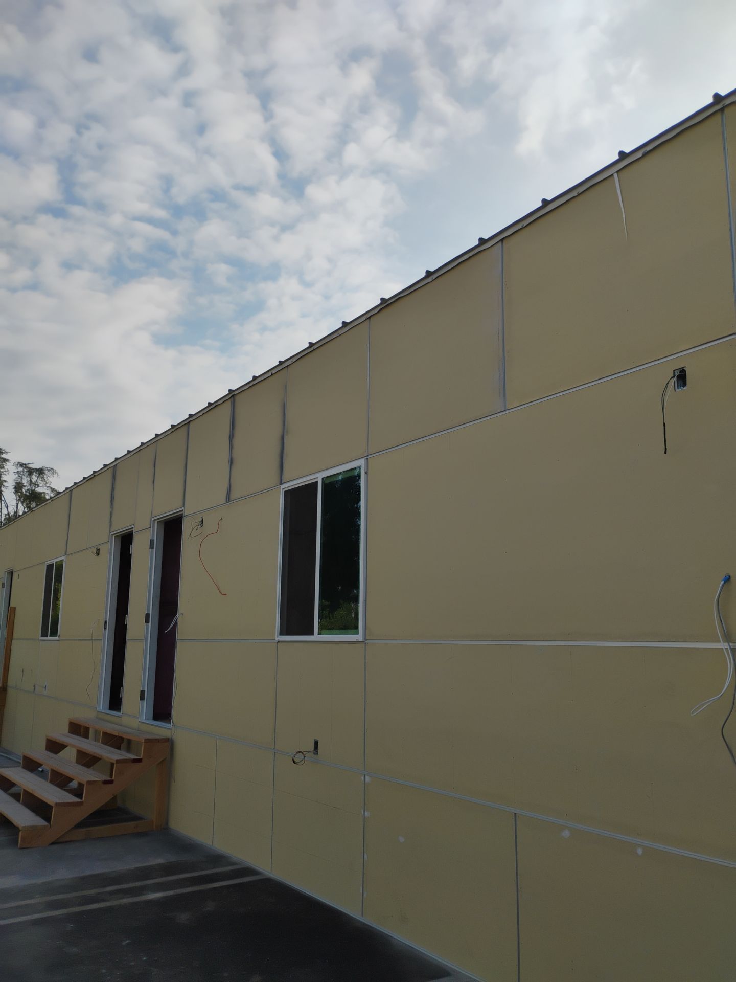 Panels and metals  by New Era Siding Inc 