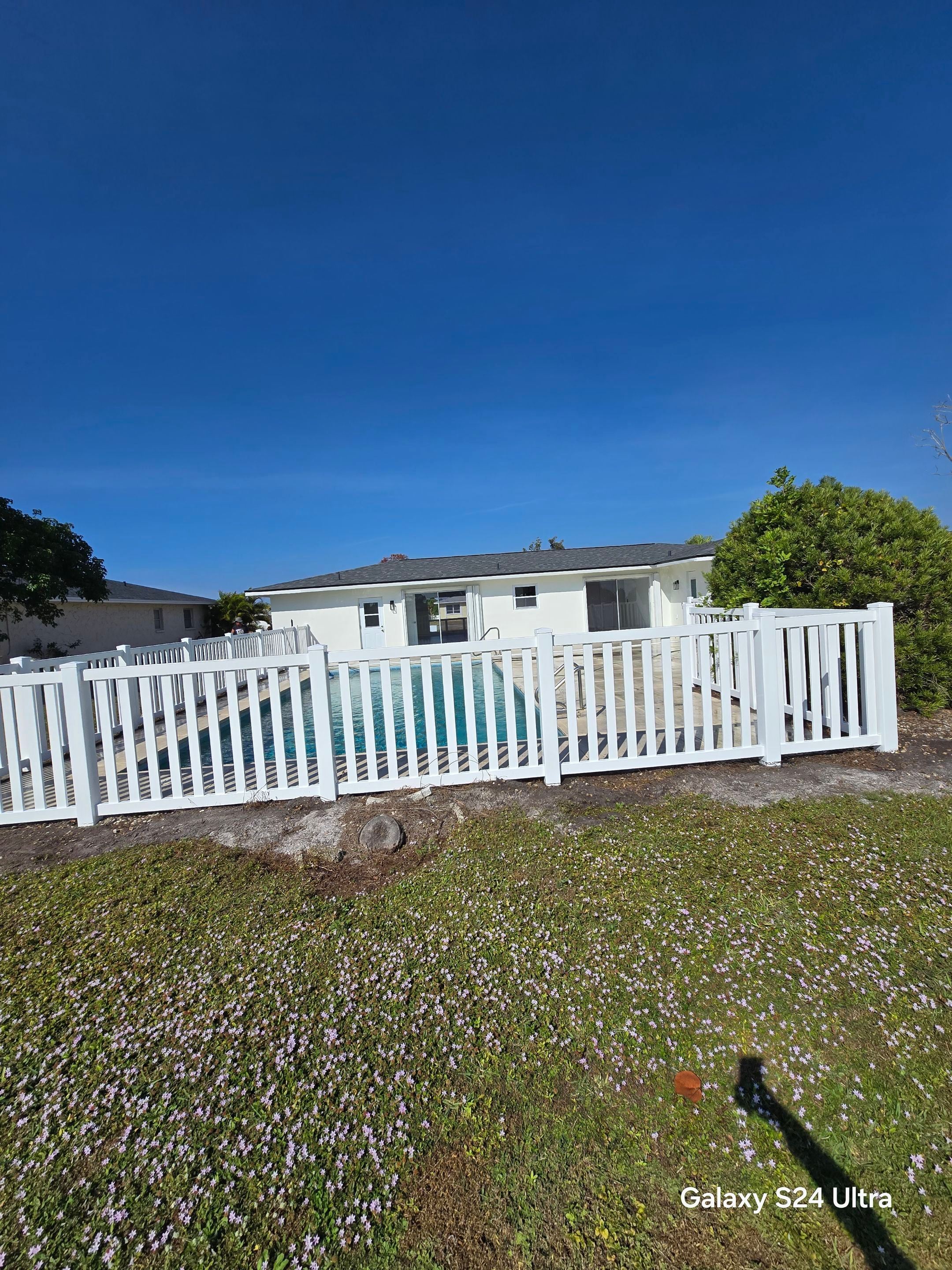 Vinyl Picket Fence for Pool in Port Charlotte by True Fence LLC
