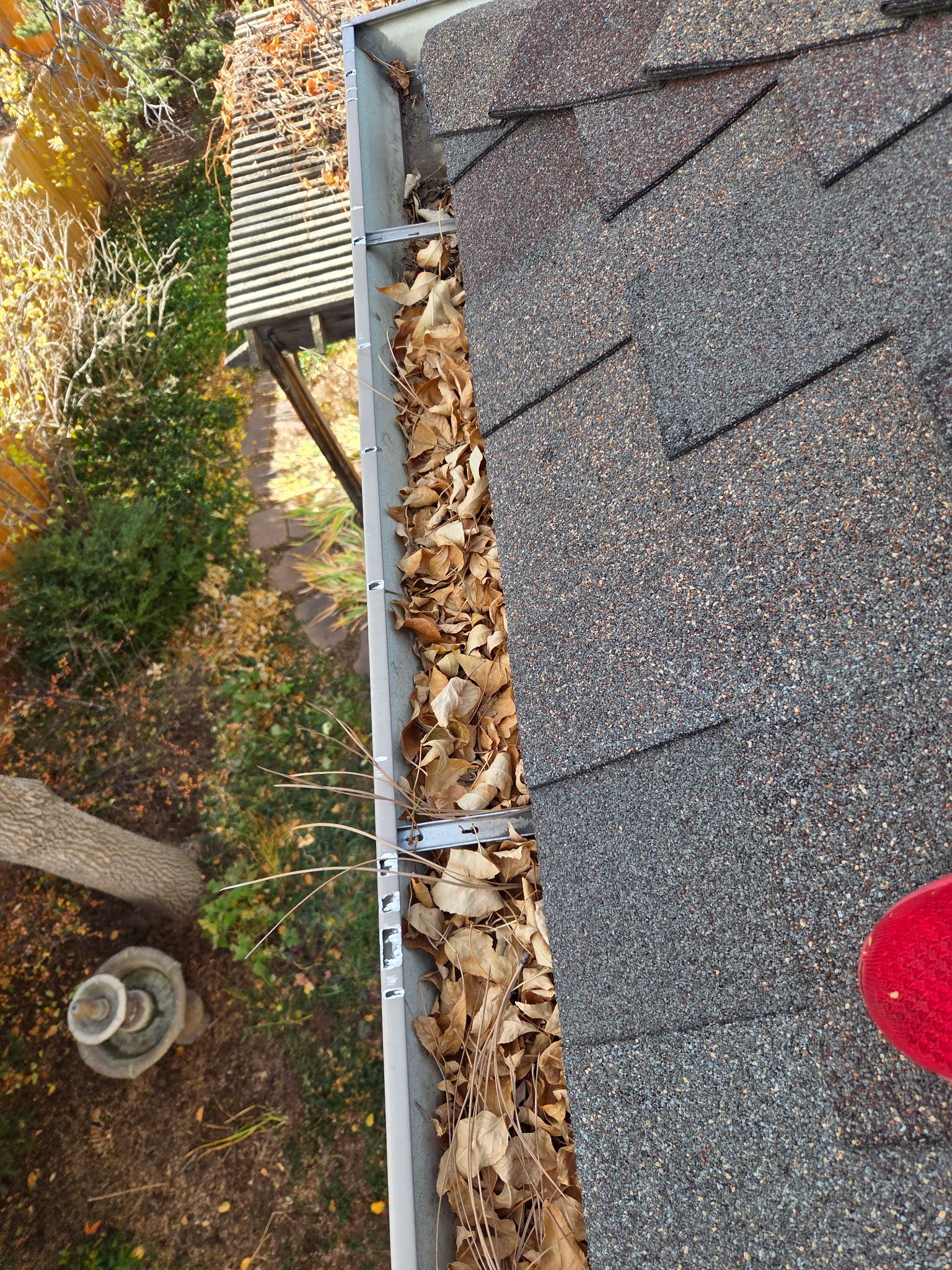 Gutter and Downspout Cleaning by RTP Roofing Company