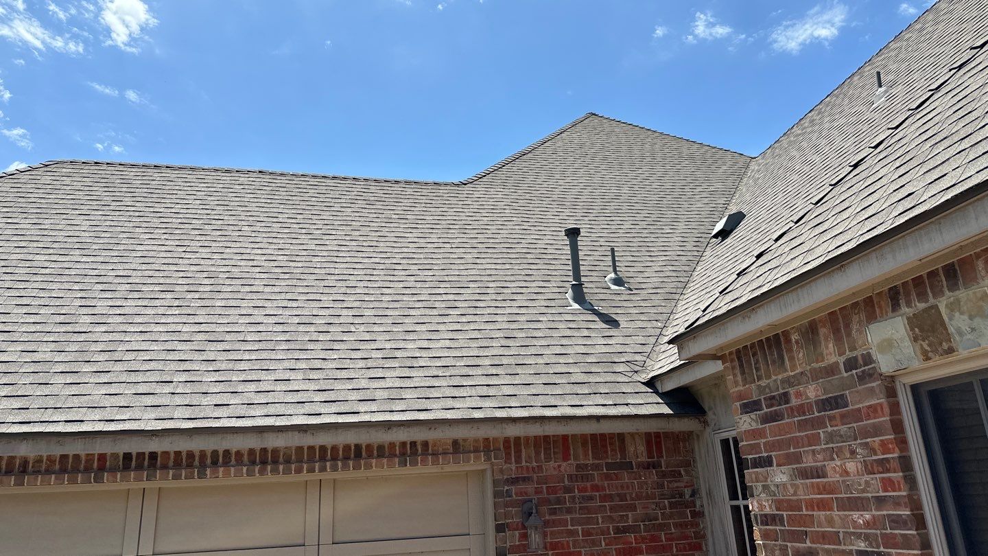 Roof Replacement and Gutter Installation in Edmond, OK by McCann's Roofing and Construction