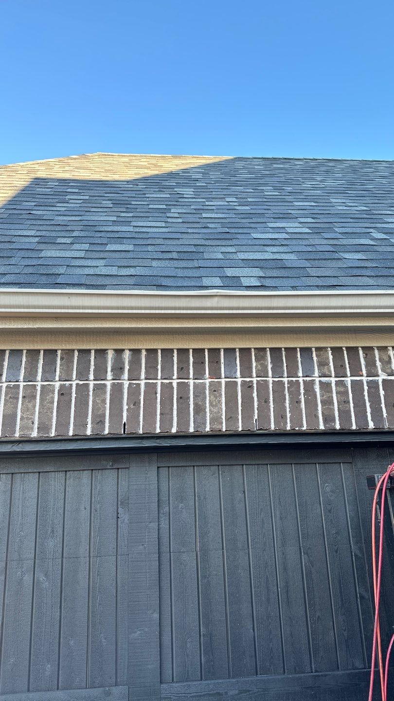 Red Brick with Malarkey Storm Grey by Tejas Roofworks + Restoration