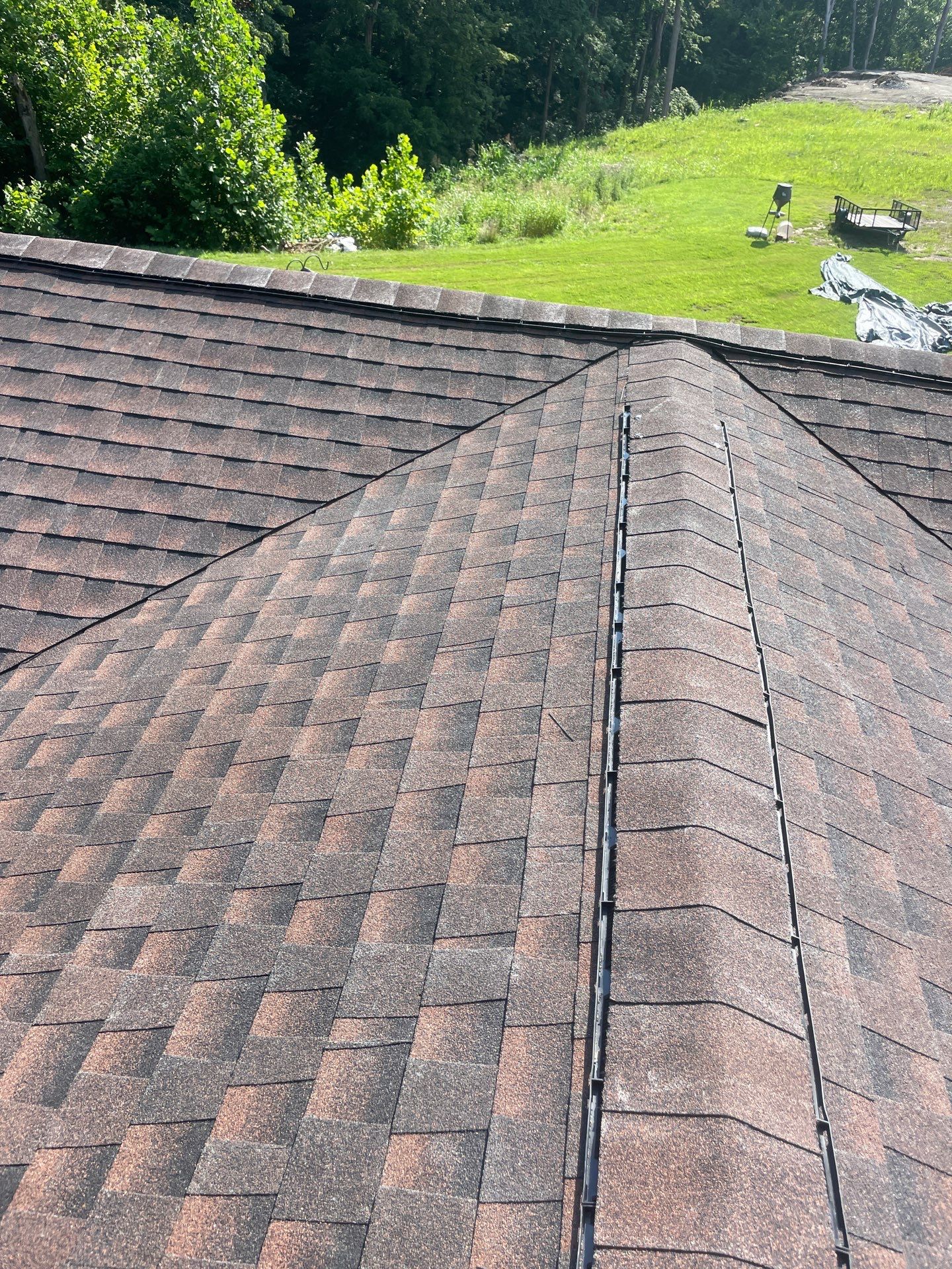 Residential Roofing Installation using GAF TImberline HDZ Hickory by Rainstoppers Roofing