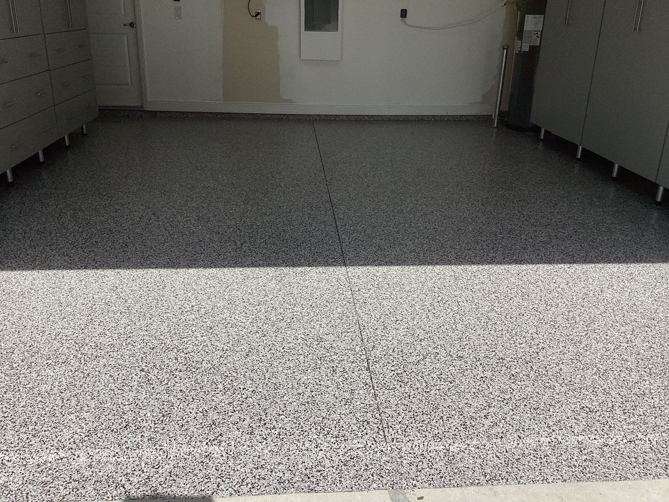 Garage using Domino by Amvet concrete coatings llc