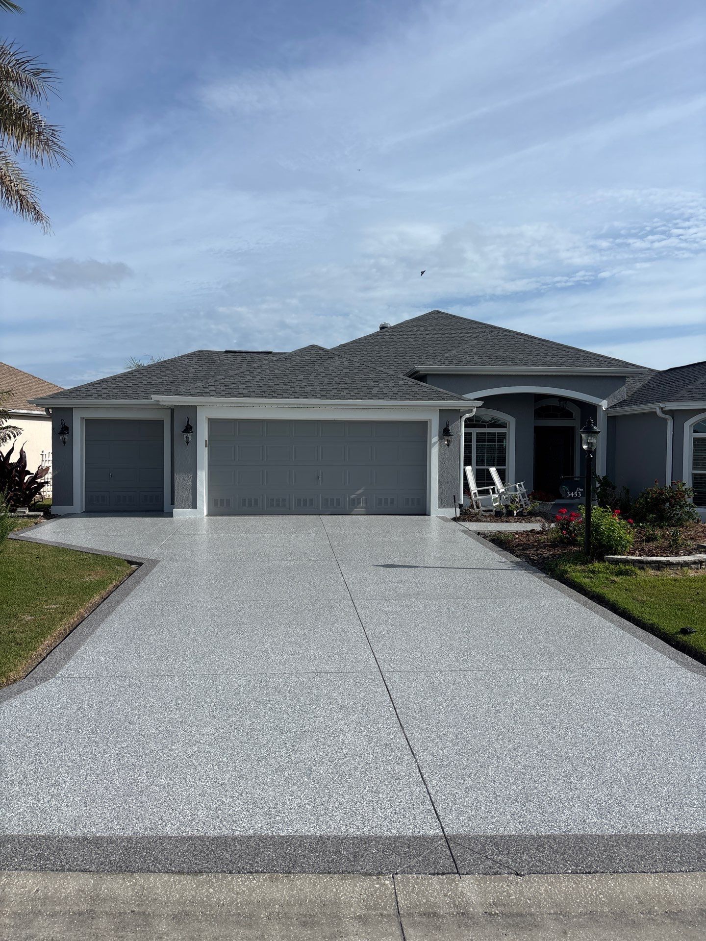 Driveway & Sidewalk Slatestone with Silvercreek borders by Innovative Concrete Coatings 