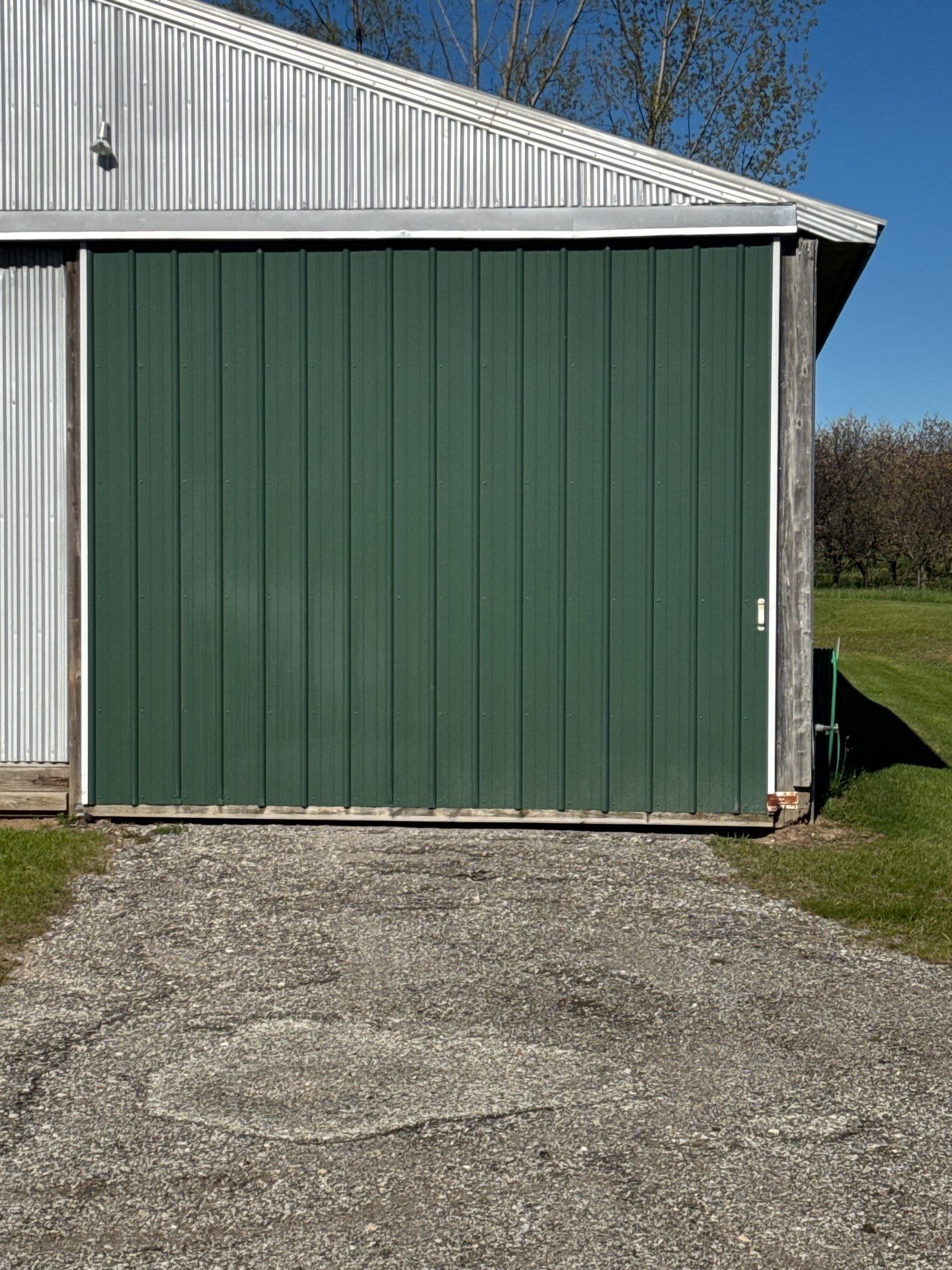 Exterior Painting and Trim Restoration for Mears Metal Buildings by Gordon Painting