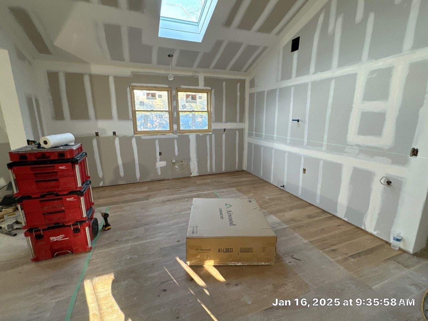 Cabinet Installation using white shaker  by Antrax Corp