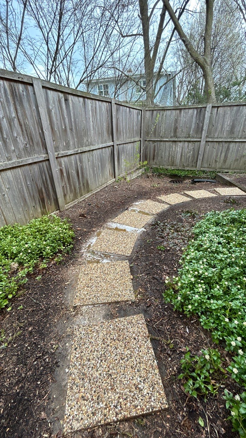 Flagstone stepper cleaning by Northern Power Washing LLC.