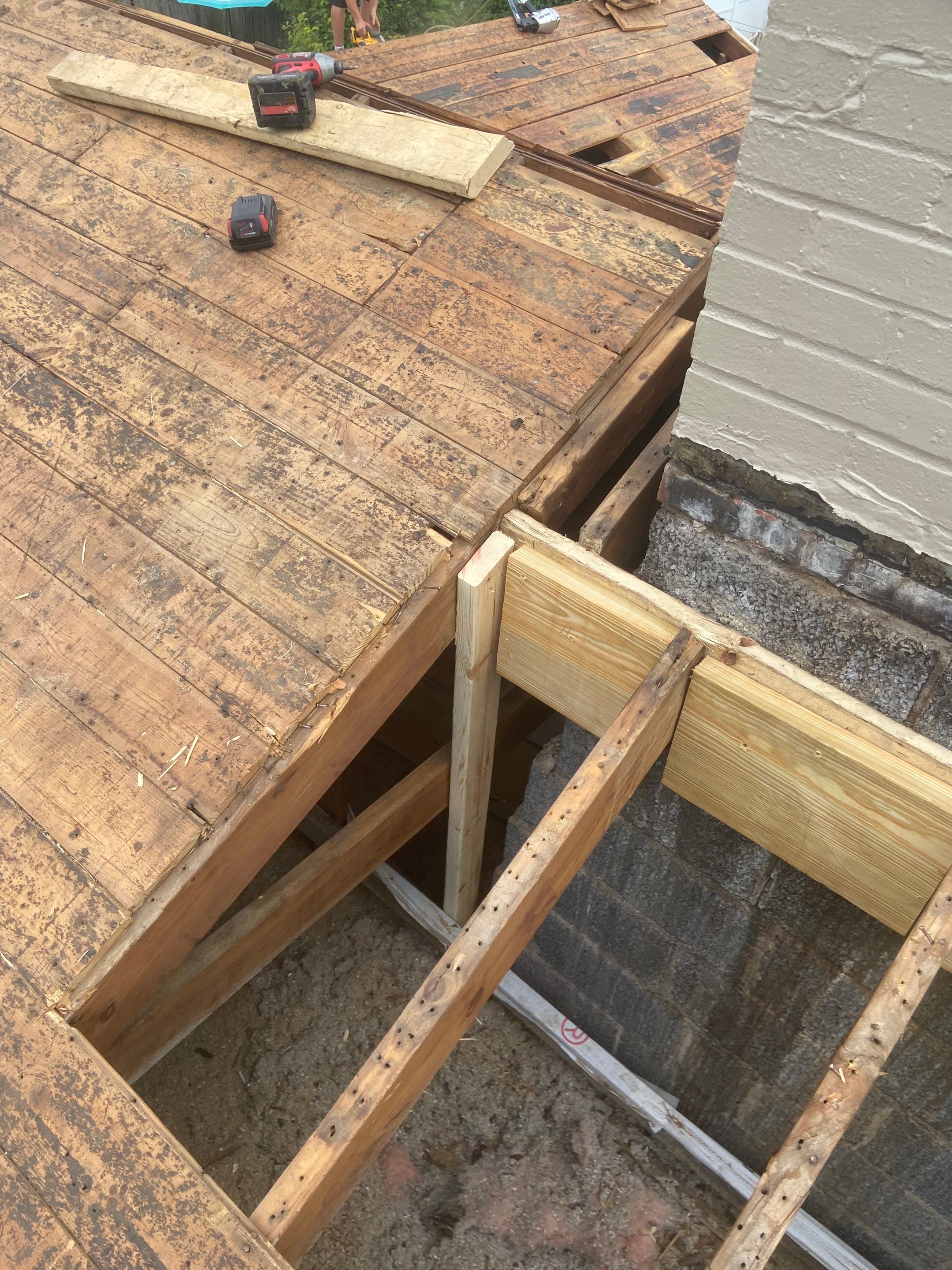 Metal Roofing, Skylights, Porch Build by Secure Construction Company Inc